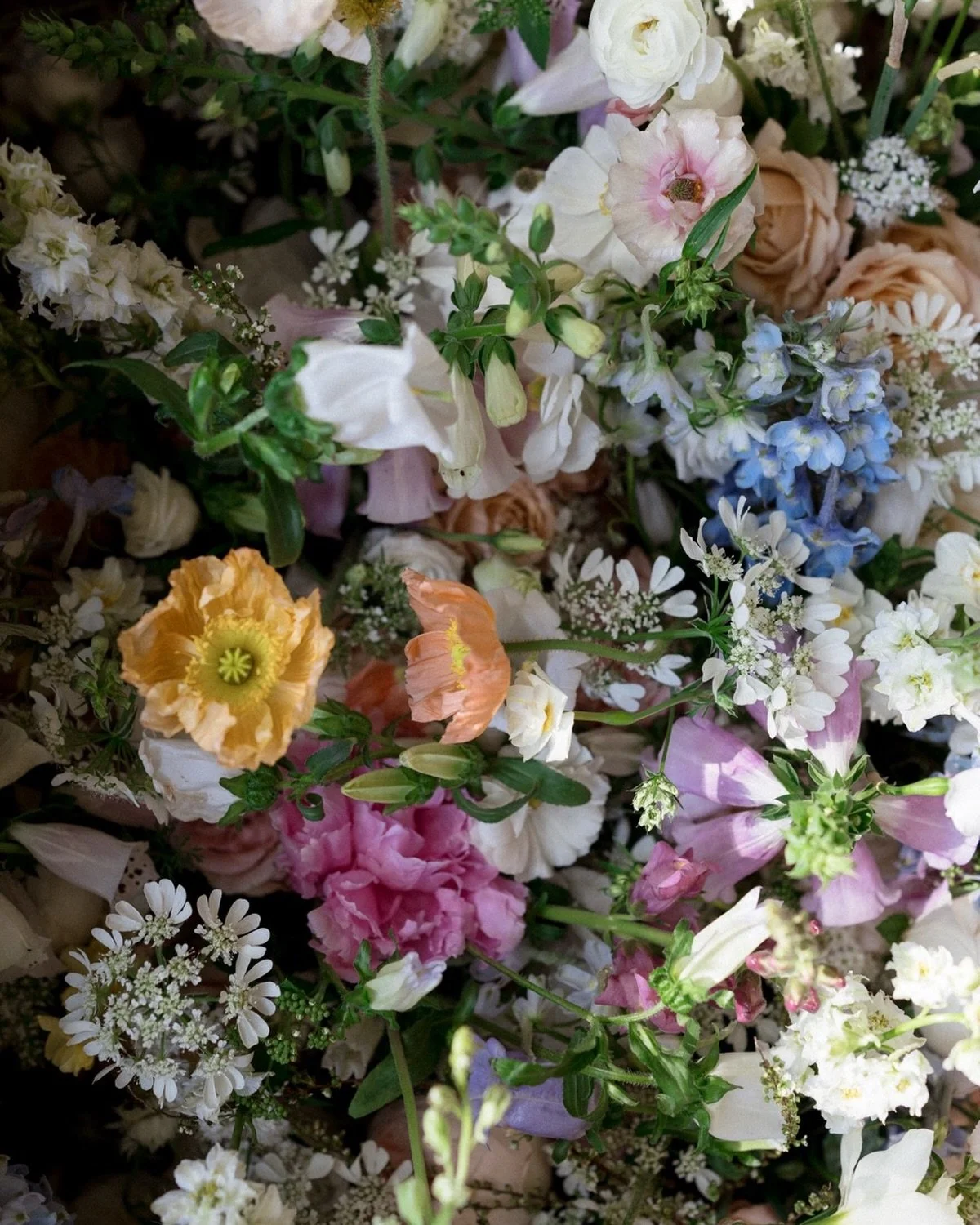 Beautiful shot by @madiflo of Mattie &amp; Sam&rsquo;s English Garden wedding. Meeting a couple who value old world florals as much as I do was pure serendipity for me.