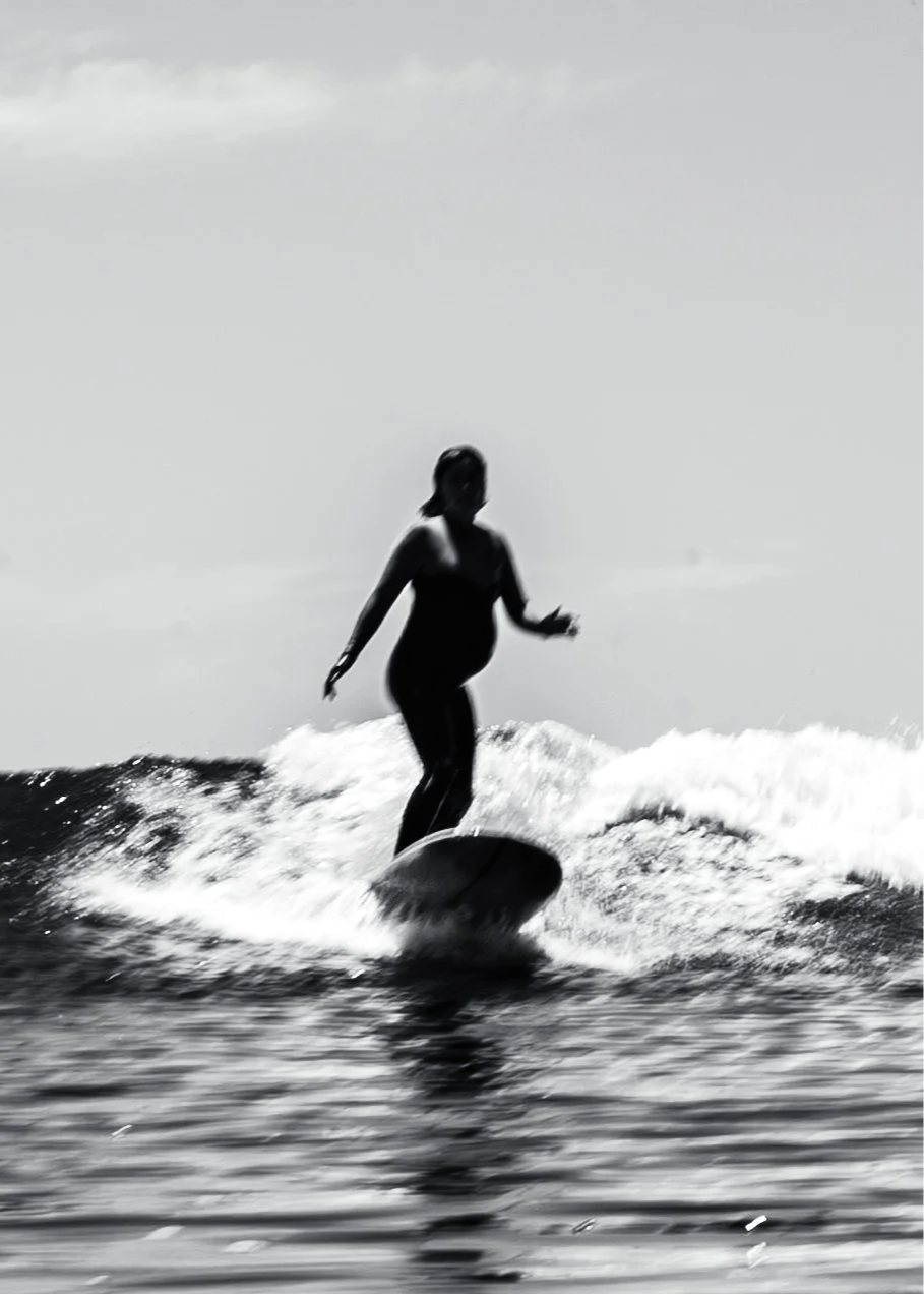 pregnant woman surfing