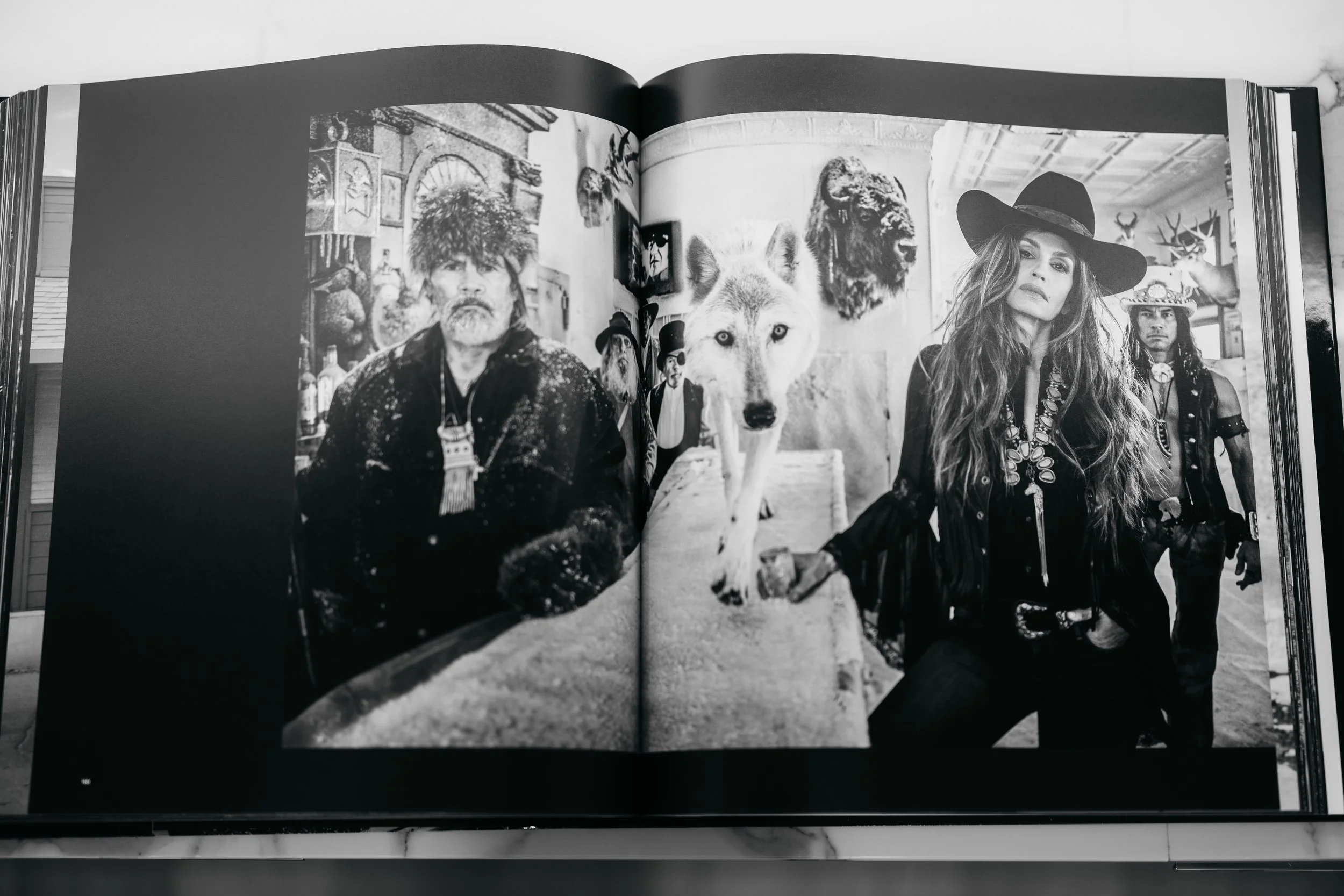 David Yarrow's coffee table book displayed at AMLI Fountain Place's influencer event.