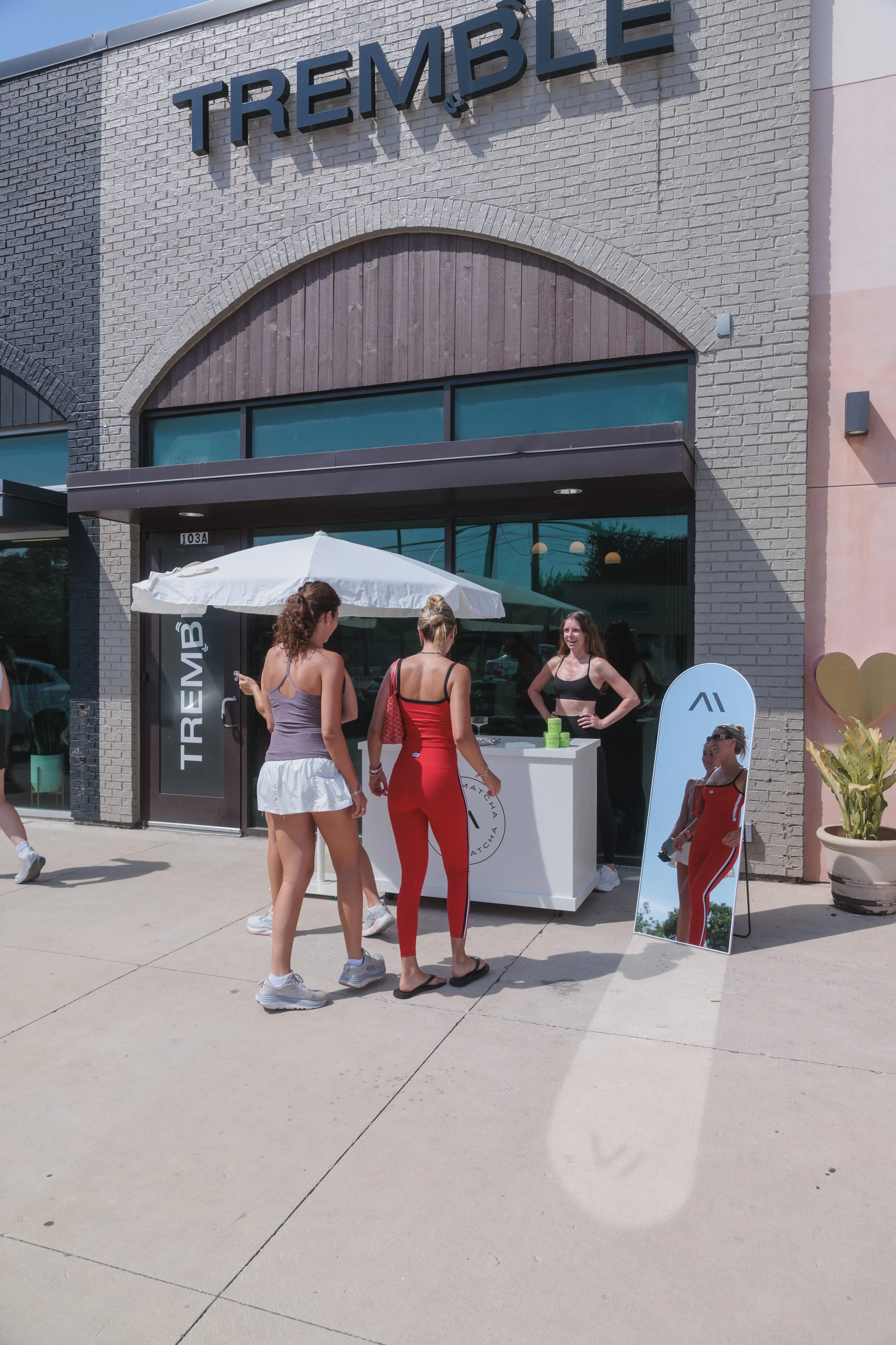 Storefront retail activation for Tremble pilates studio.
