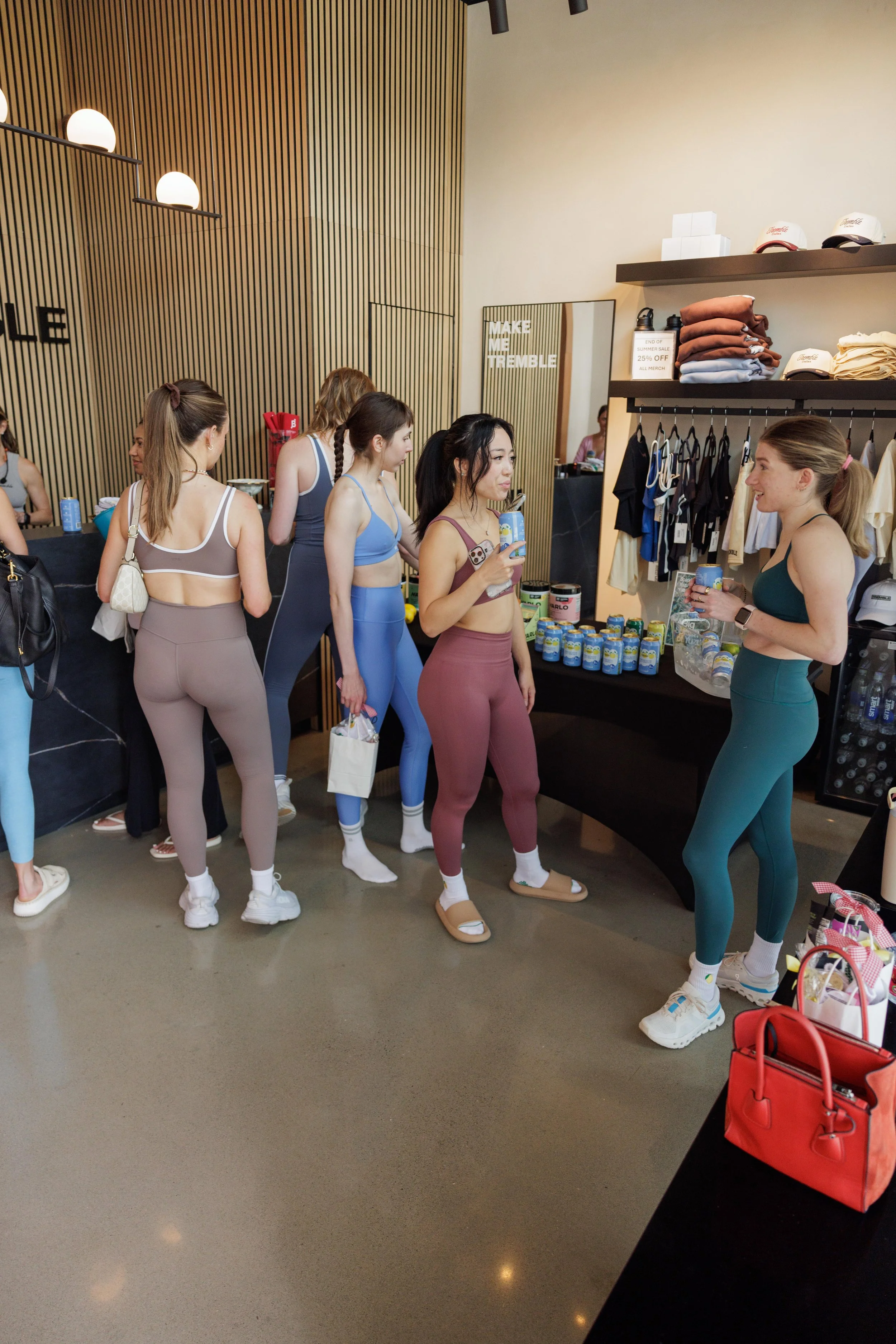pilates_studio_clients_gathered_around_brand_activation_event.jpg