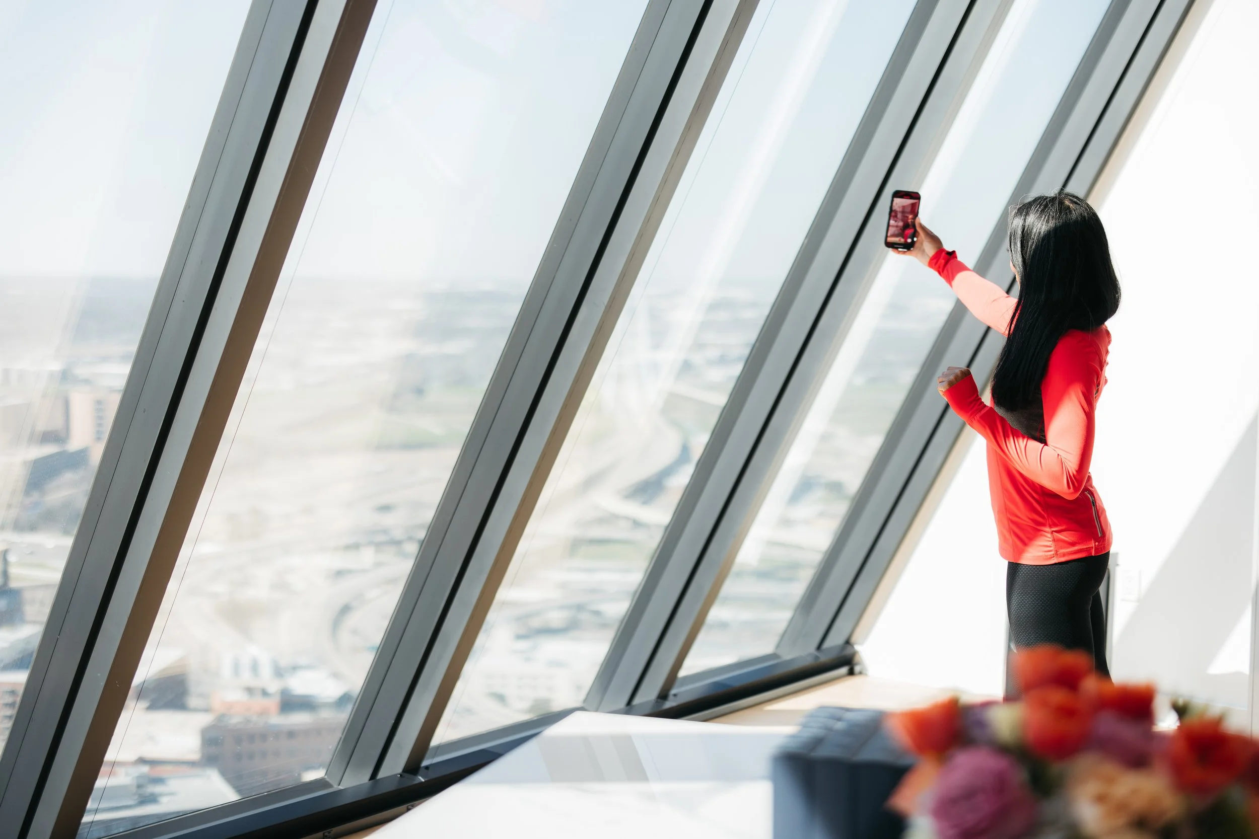 Keynote speaker, Dr. Jessica Shepherd, taking a selfie at AMLI Fountain Place brand activation event.