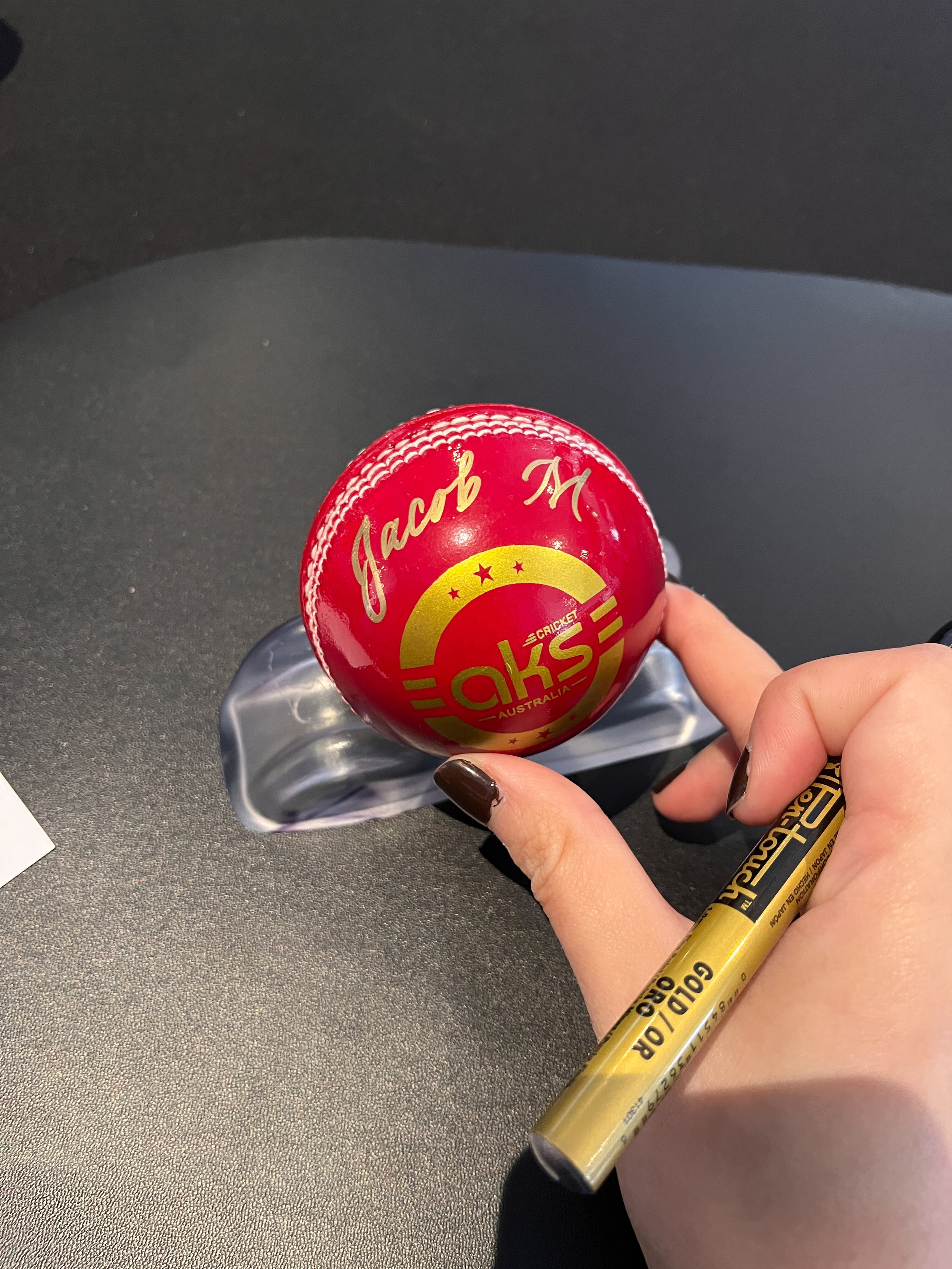 hand-lettering-closeup-cricket-ball-live-event-artist-kristie-onasis-calligraphy-perth-australia.JPG
