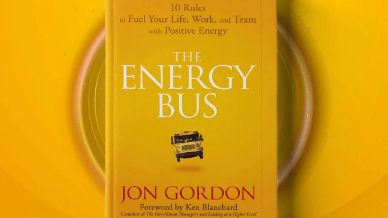 Cover of the book 'The Energy Bus' by Jon Gordon, featuring a yellow background, a small image of a bus, and the subtitle '10 Rules to Fuel Your Life, Work, and Team with Positive Energy.'