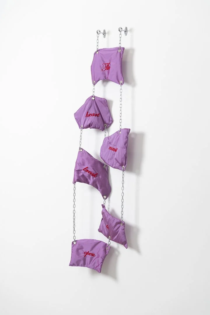 The heart must break, 2025,taffeta fabric, cotton stuffing, eyelets, cotton thread,stainless steel, 134x42x10 cm