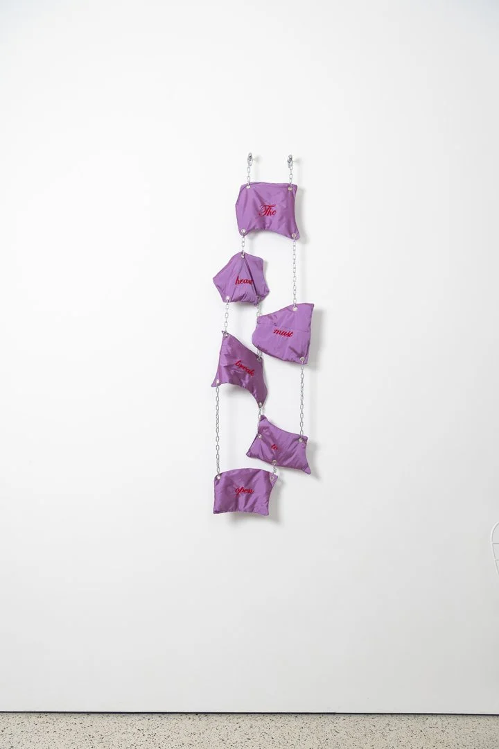 The heart must break, 2025,taffeta fabric, cotton stuffing, eyelets, cotton thread,stainless steel, 134x42x10 cm