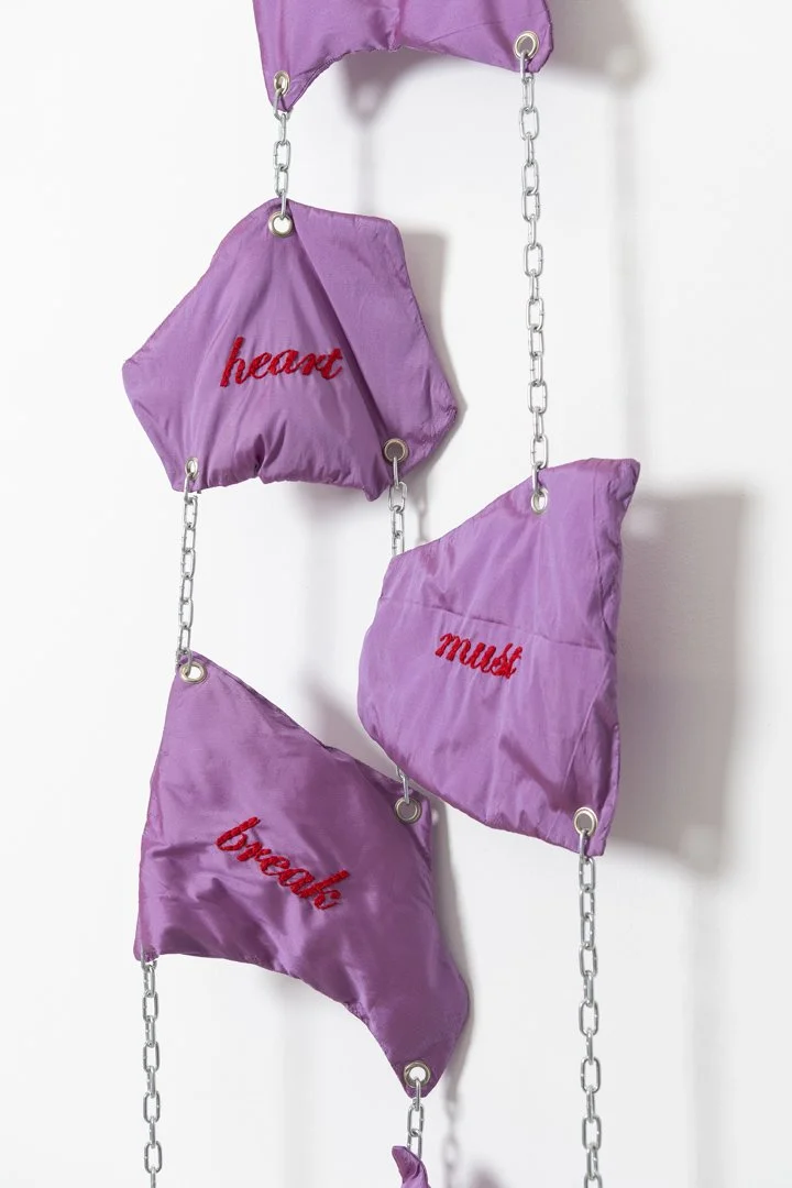 The heart must break, 2025,taffeta fabric, cotton stuffing, eyelets, cotton thread,stainless steel, 134x42x10 cm
