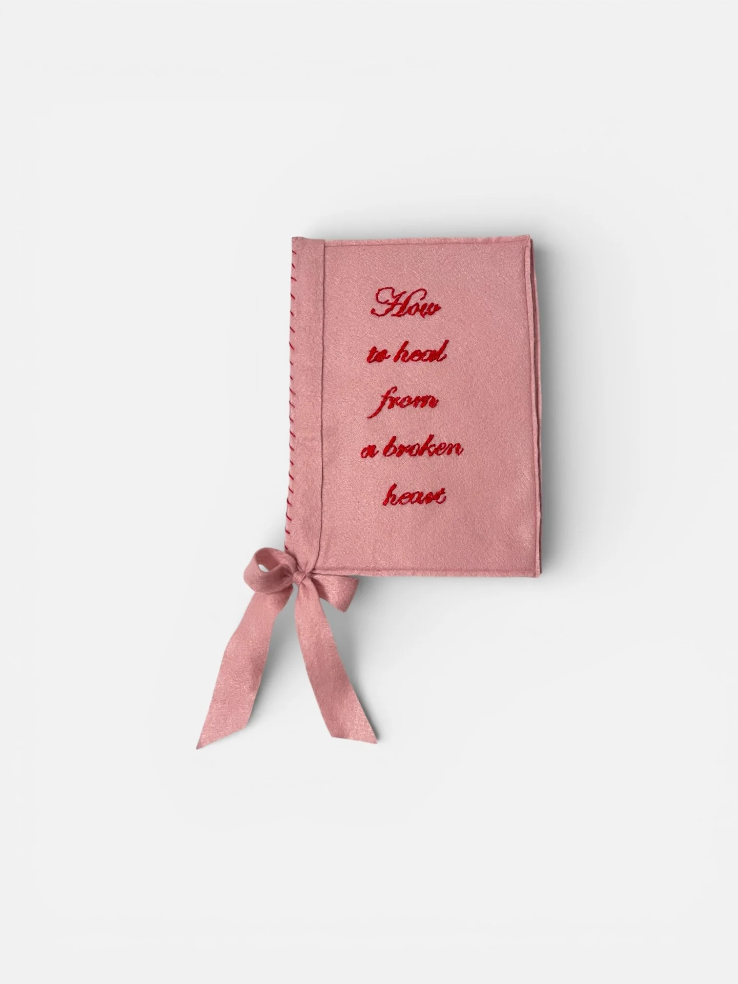 How to heal from a broken heart, 2026 
felt, cotton thread, ribbon
41x21x1.5cm