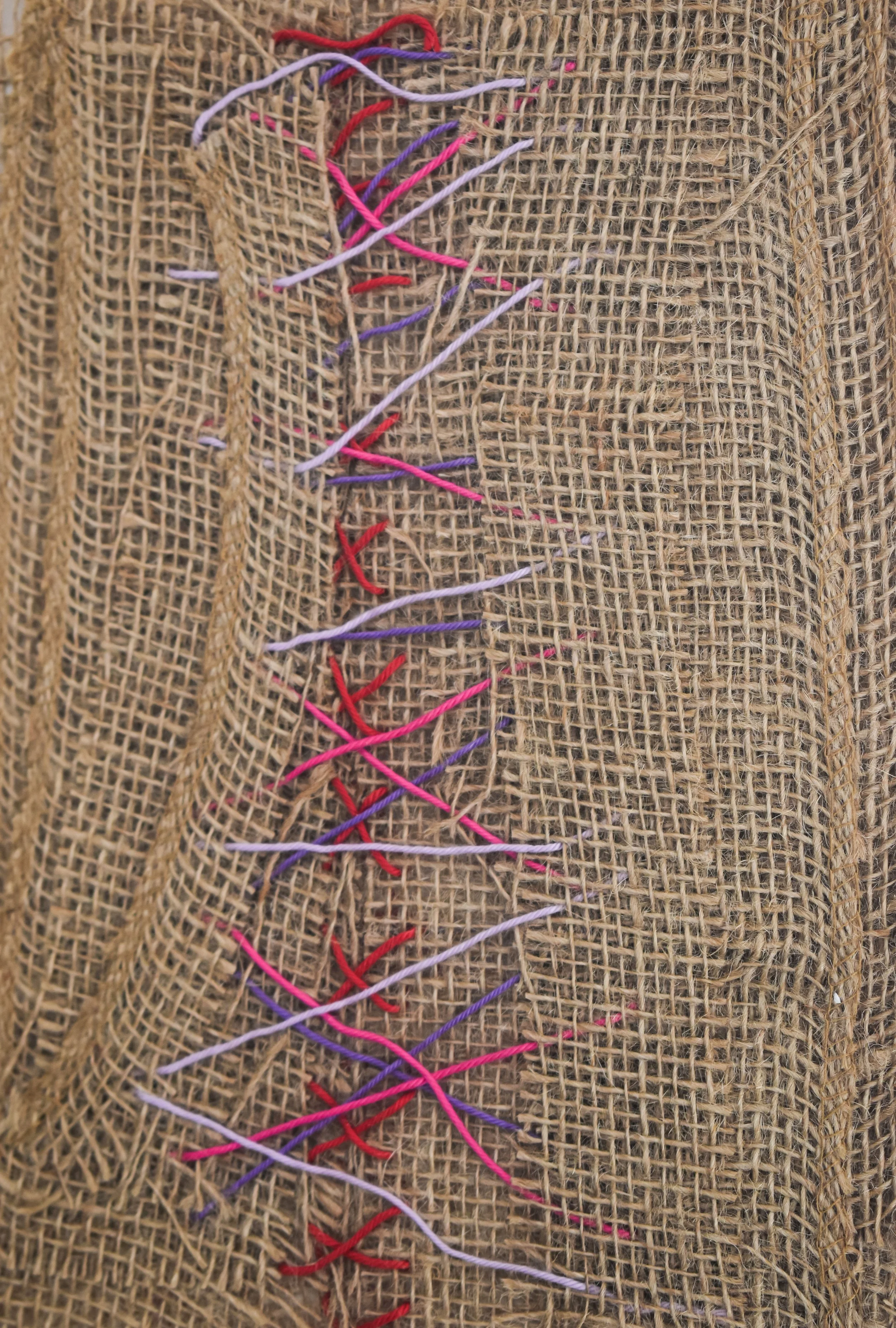 Something between #2, 2022, Burlap fabric, wool, fabric glue, 42x35cm