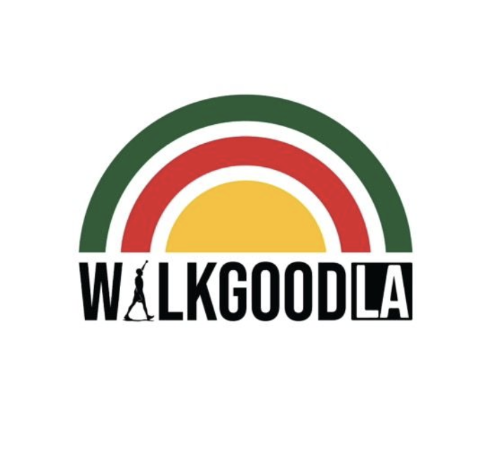 A logo with a rainbow arch with green, red, and yellow bands, and the word 'WALKGOODLA' underneath. The letter 'L' in 'WALK' is stylized as a person walking.