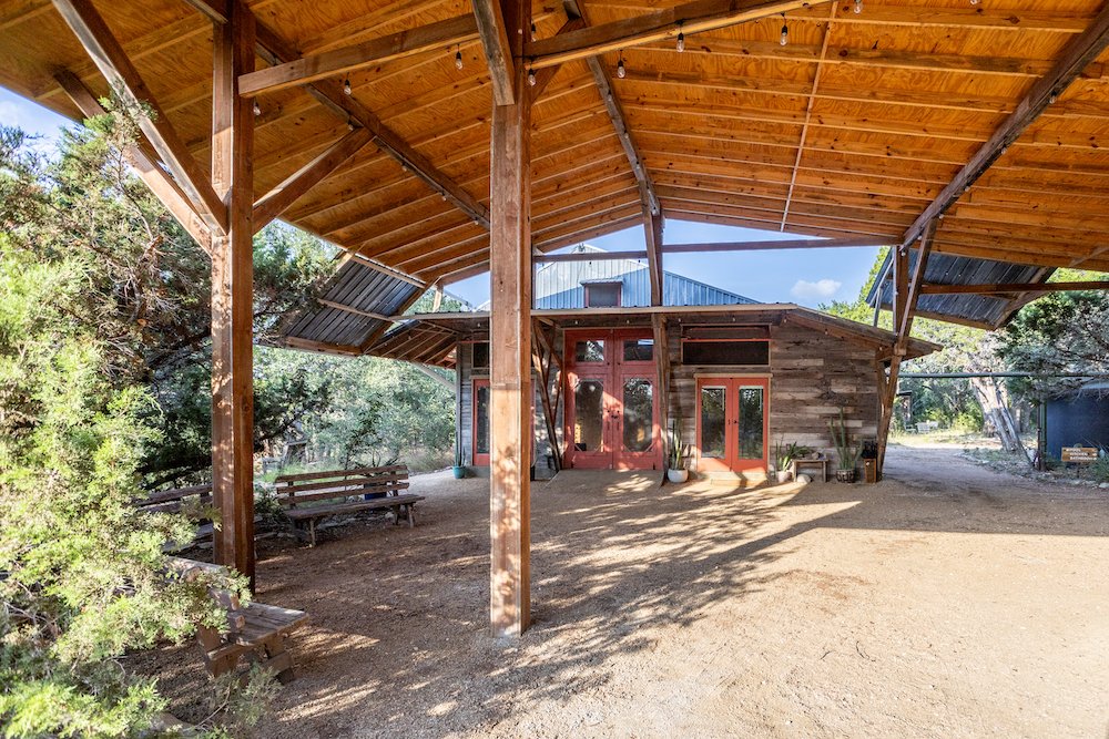 The covered Courtyard is a lovely shaded outdoor gathering space that can be filled with our provided tables and chairs. 