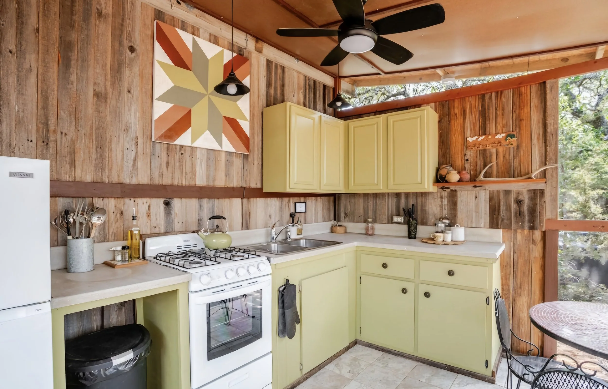 detached screened in outdoor full kitchen