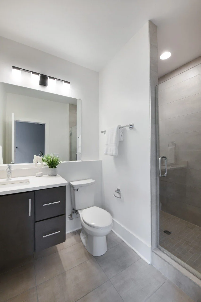 Contemporary bathroom with a spacious shower and sleek vanity in a Chestnut Hill townhouse available for rent