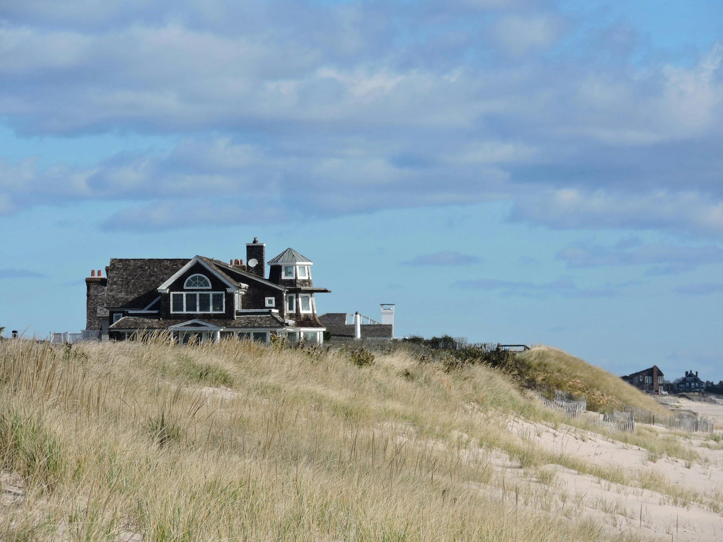 Buying a Second Home in New York: Woodstock vs. the Hamptons