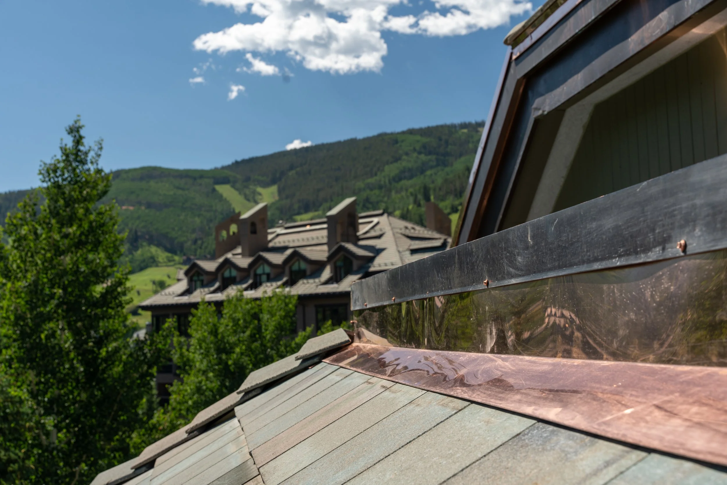 Beaver Creek Colorado Commercial Roof. Tile roof with copper details.