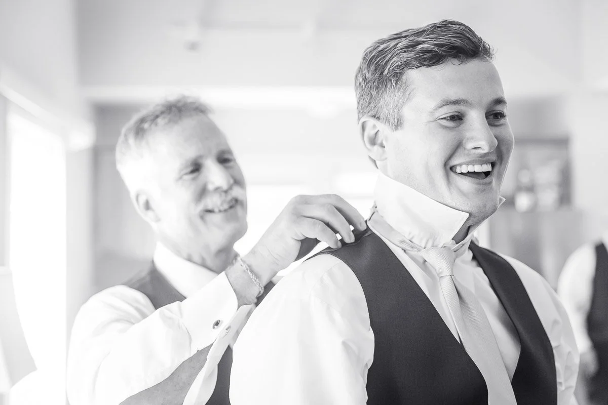 father-helping-groom-get-ready-new-hampshire-wedding..jpg