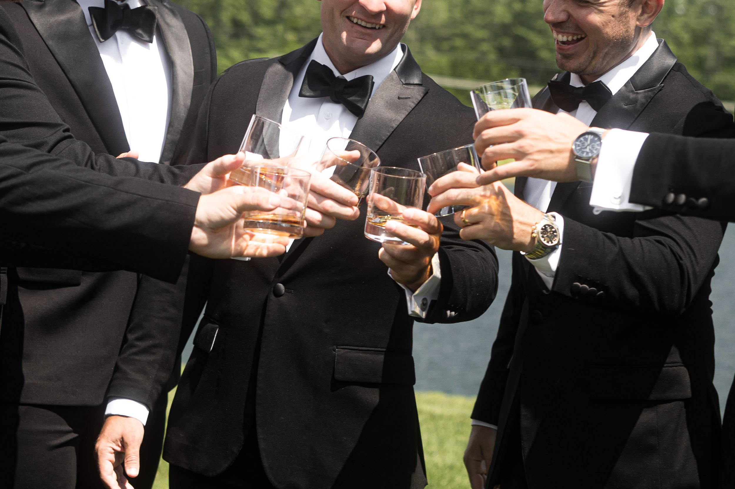 owls-nest-resort-groomsmen-whiskey-toast.jpg
