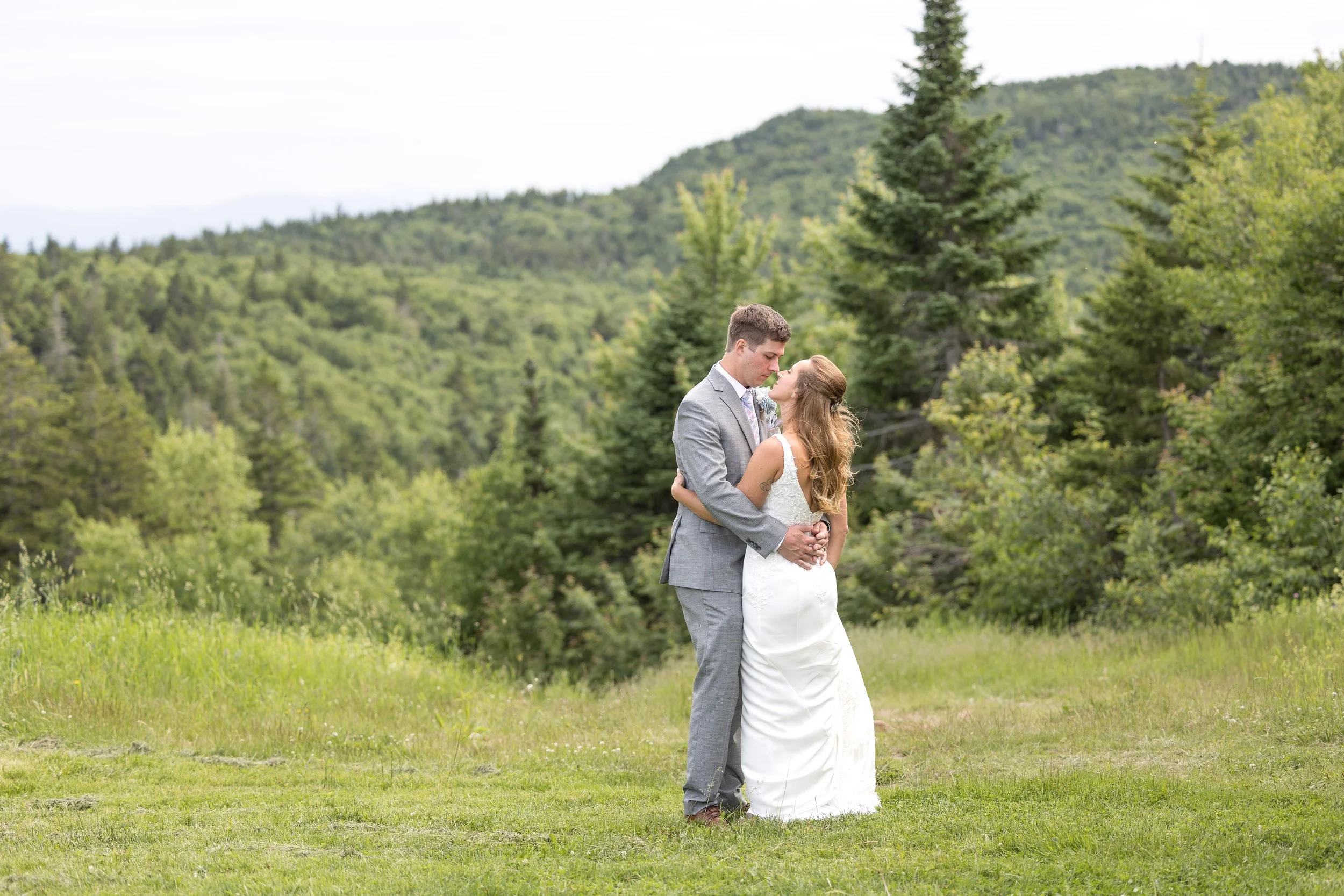 loon-mountain-wedding-couple-portrait-field.jpg