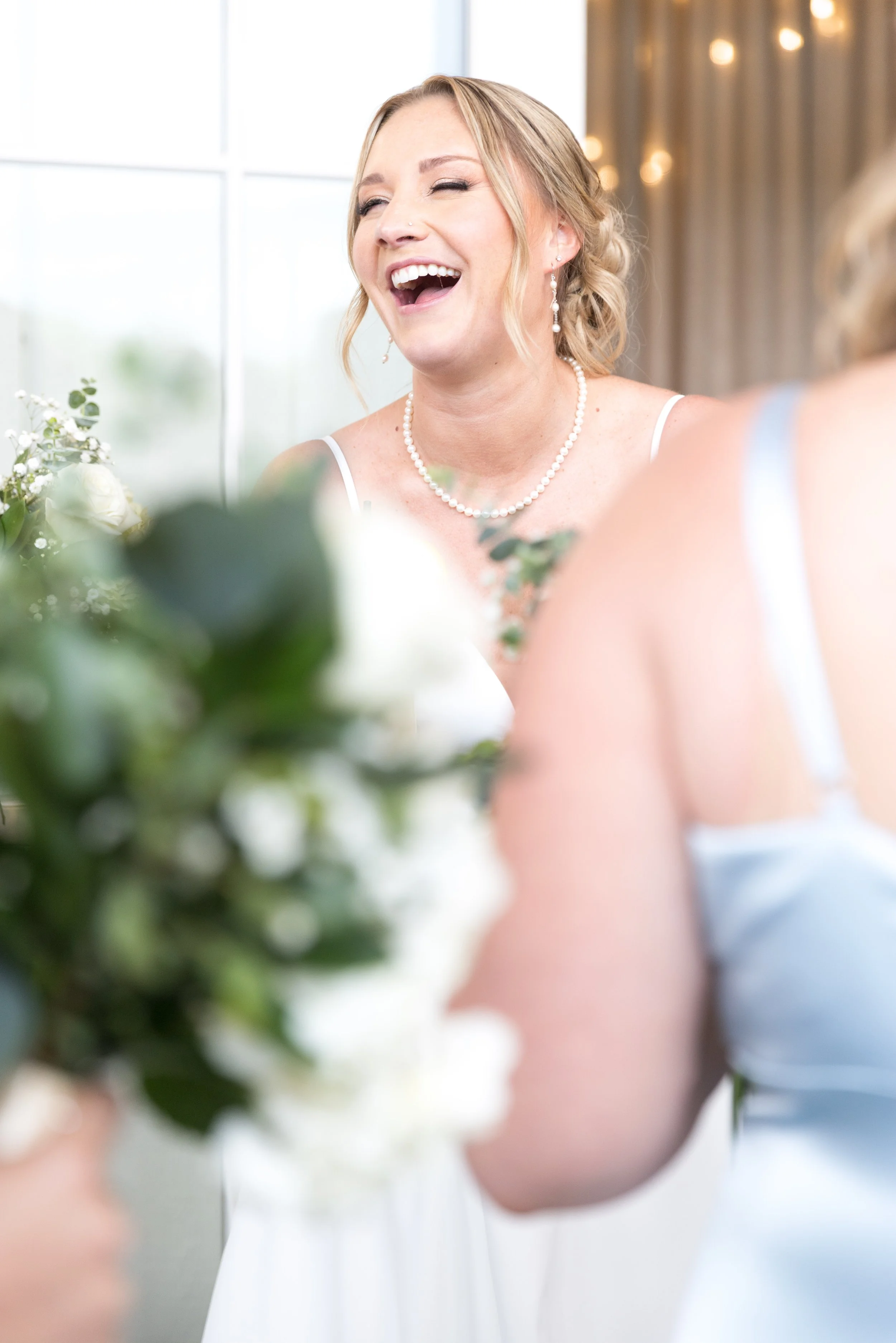 owls-nest-wedding-bride-laughing-getting-ready.jpg