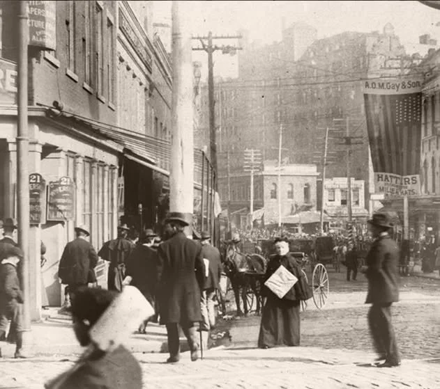 In this 1890s view, you&rsquo;re looking north up what was then Whitehall Street, toward Wall Street and the majestic Kimball House Hotel, one of Atlanta&rsquo;s grandest landmarks. With gas lamps, dirt roads, and horse-drawn streetcars, this was Atl