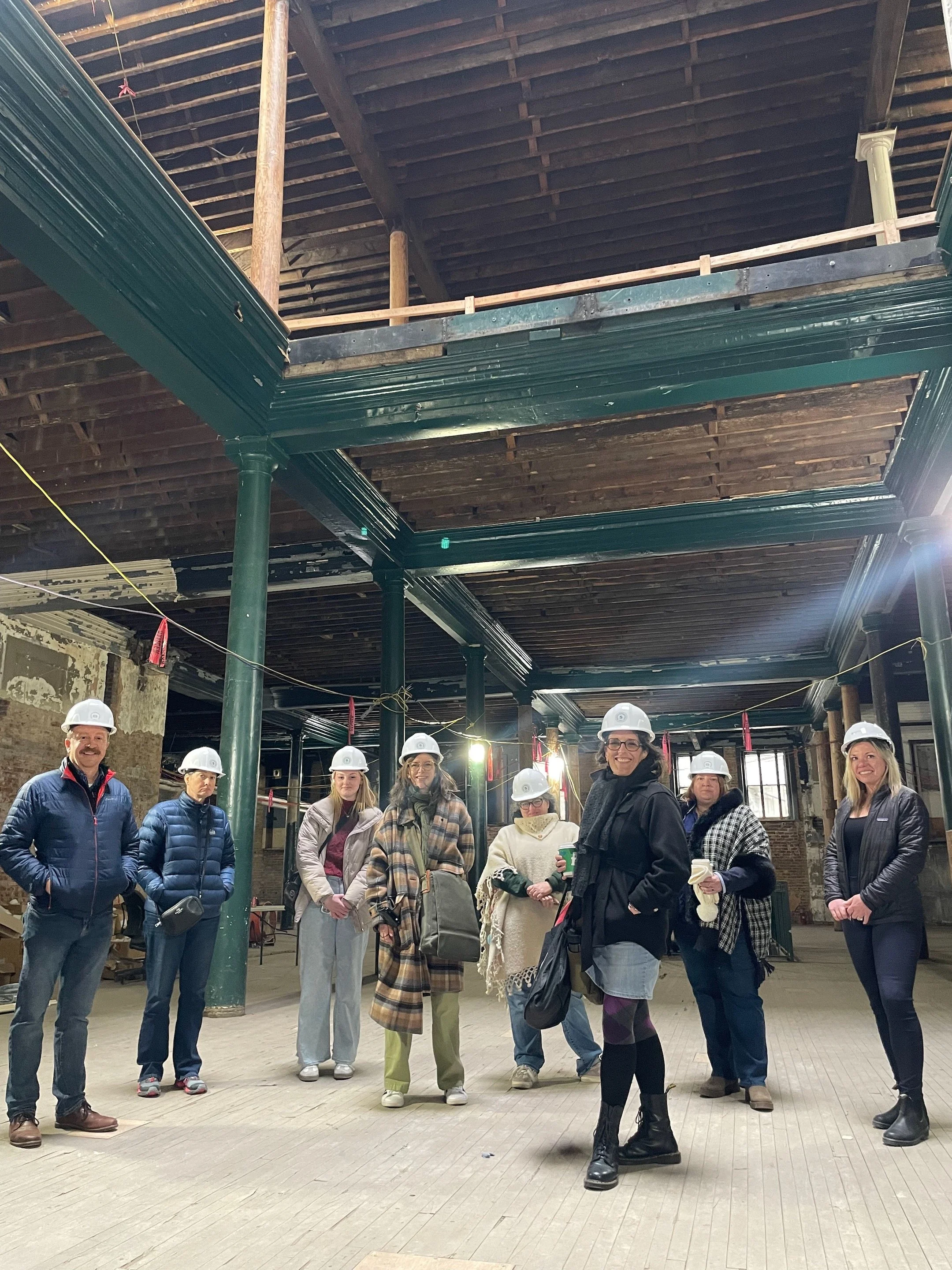 Group under skylight at 82 Peachtree Street SW