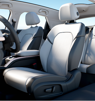 Interior of a modern vehicle with gray and white front seats and dashboard.