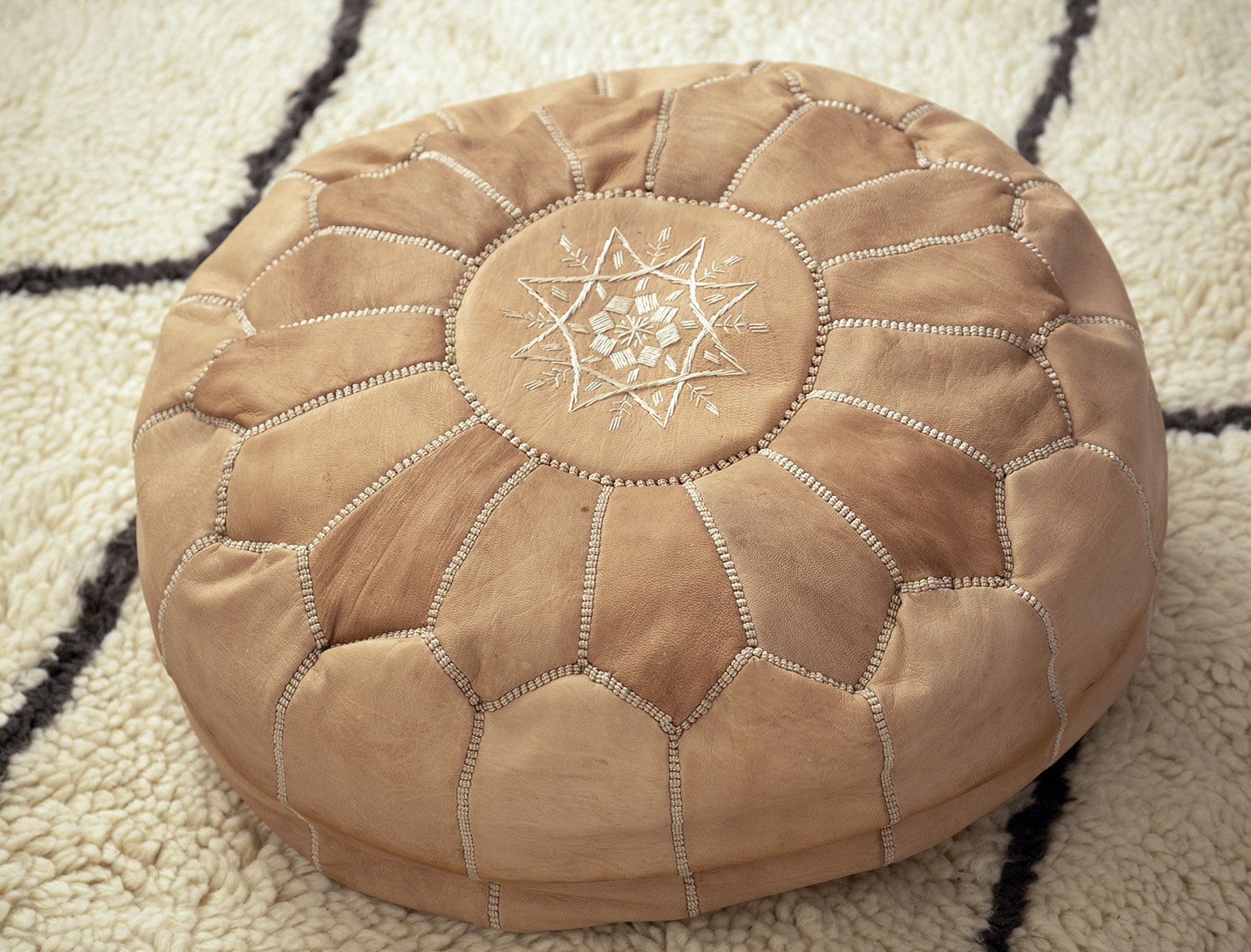 Moroccan Natural Blush Leather Pouf (2)
$25.00