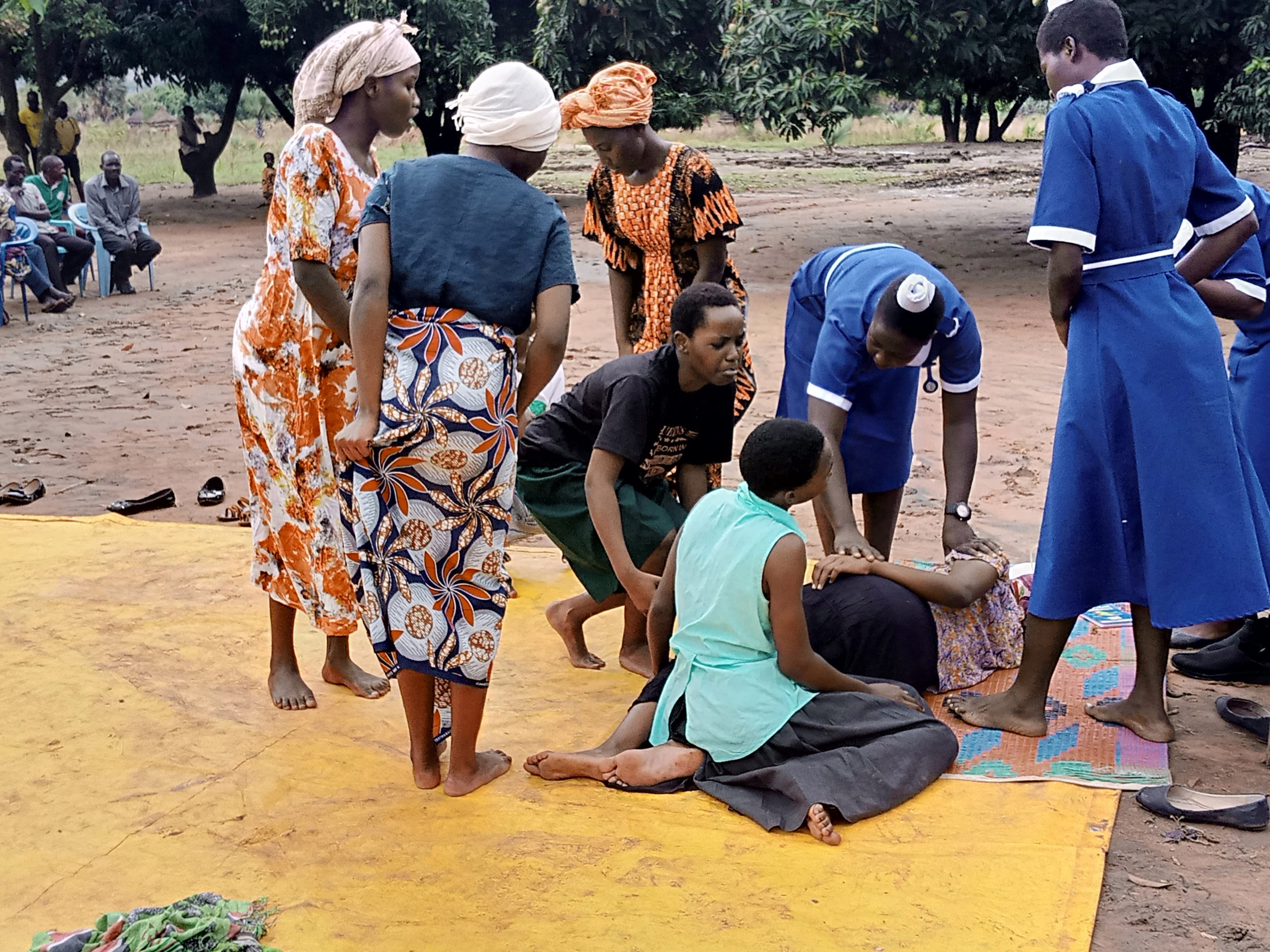 Student having a drama on causes of Mental Ilness during an outreach activity