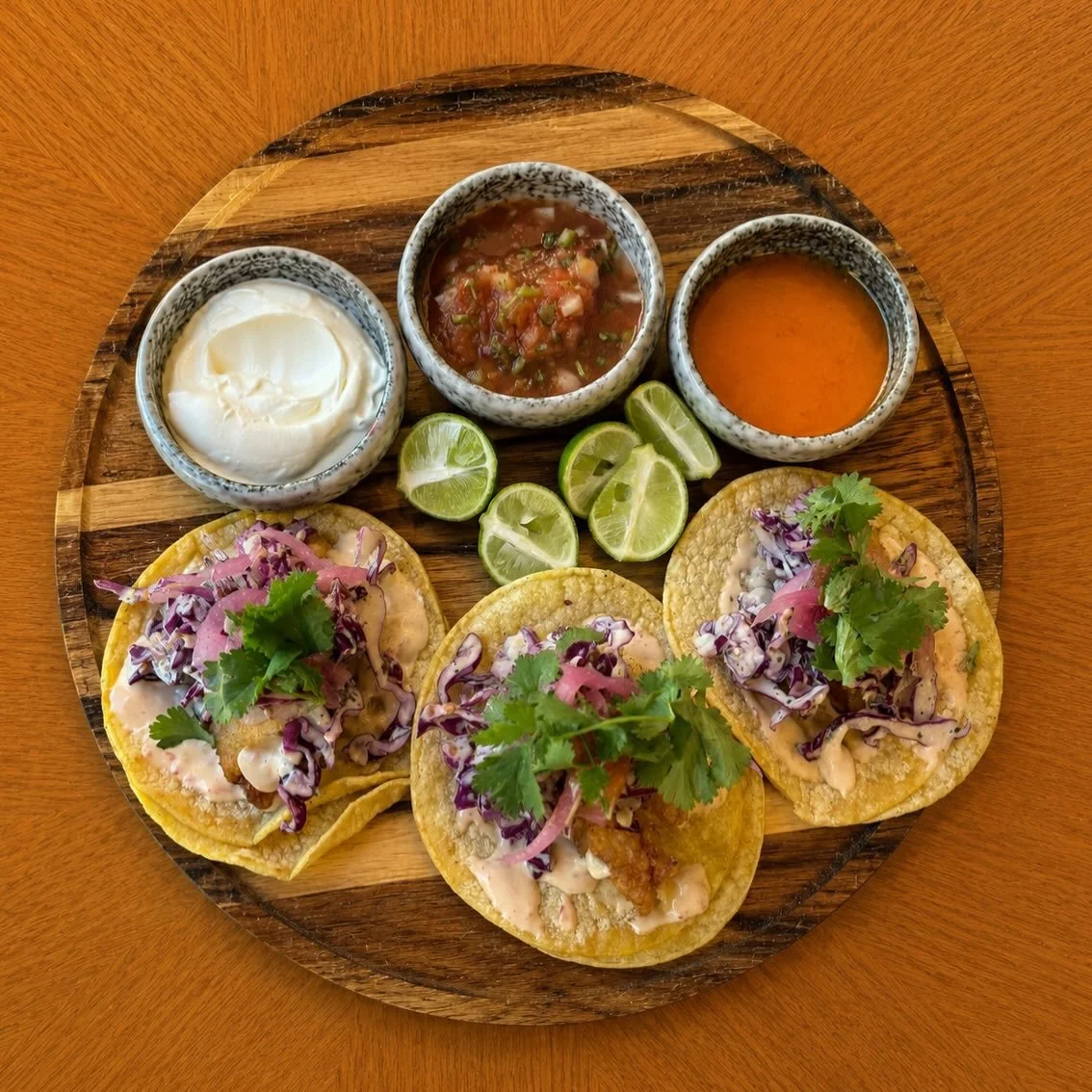 Taco Thursday, anyone? 

*New Menu Spotlight* Three crispy beer-battered fish fillets tucked into soft corn tortillas with shredded cabbage, pico de gallo, avocado and garlic crema.

Fresh, crunchy, creamy and best enjoyed poolside. ☀️🌴
