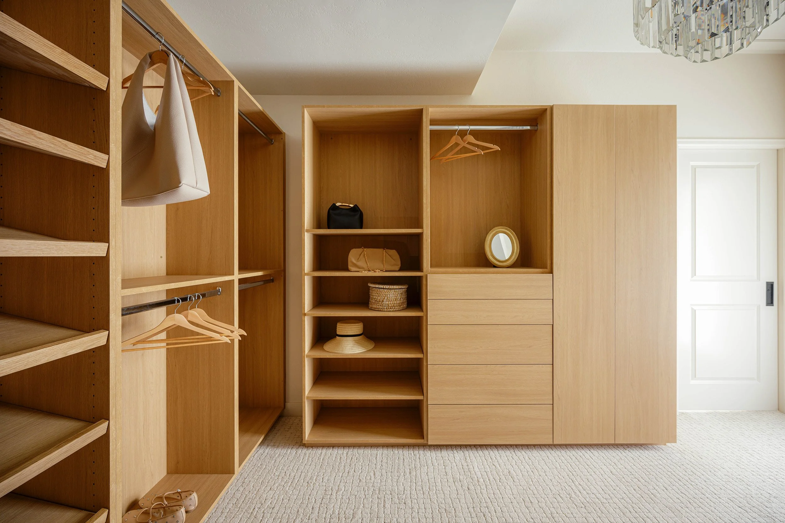 terrazzo-timber-primary-closet-light-wood-custom-cabinets.jpg