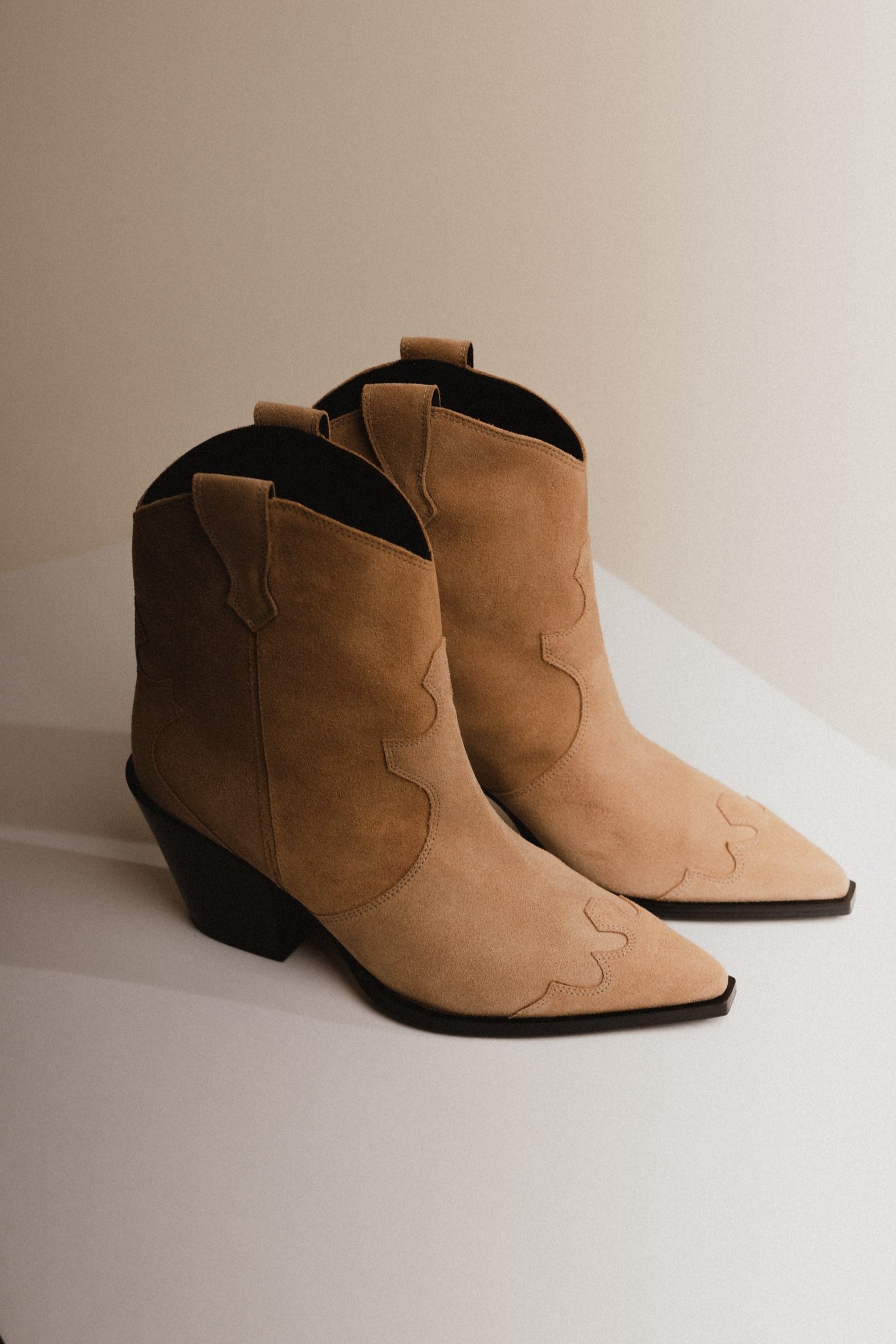  Best western style boots to shop this summer. Best Summer Sale. Best Off Season Sale. AEYDE Western Boots In Caramel. Cowboy style boots. Cowgirl style boots.  