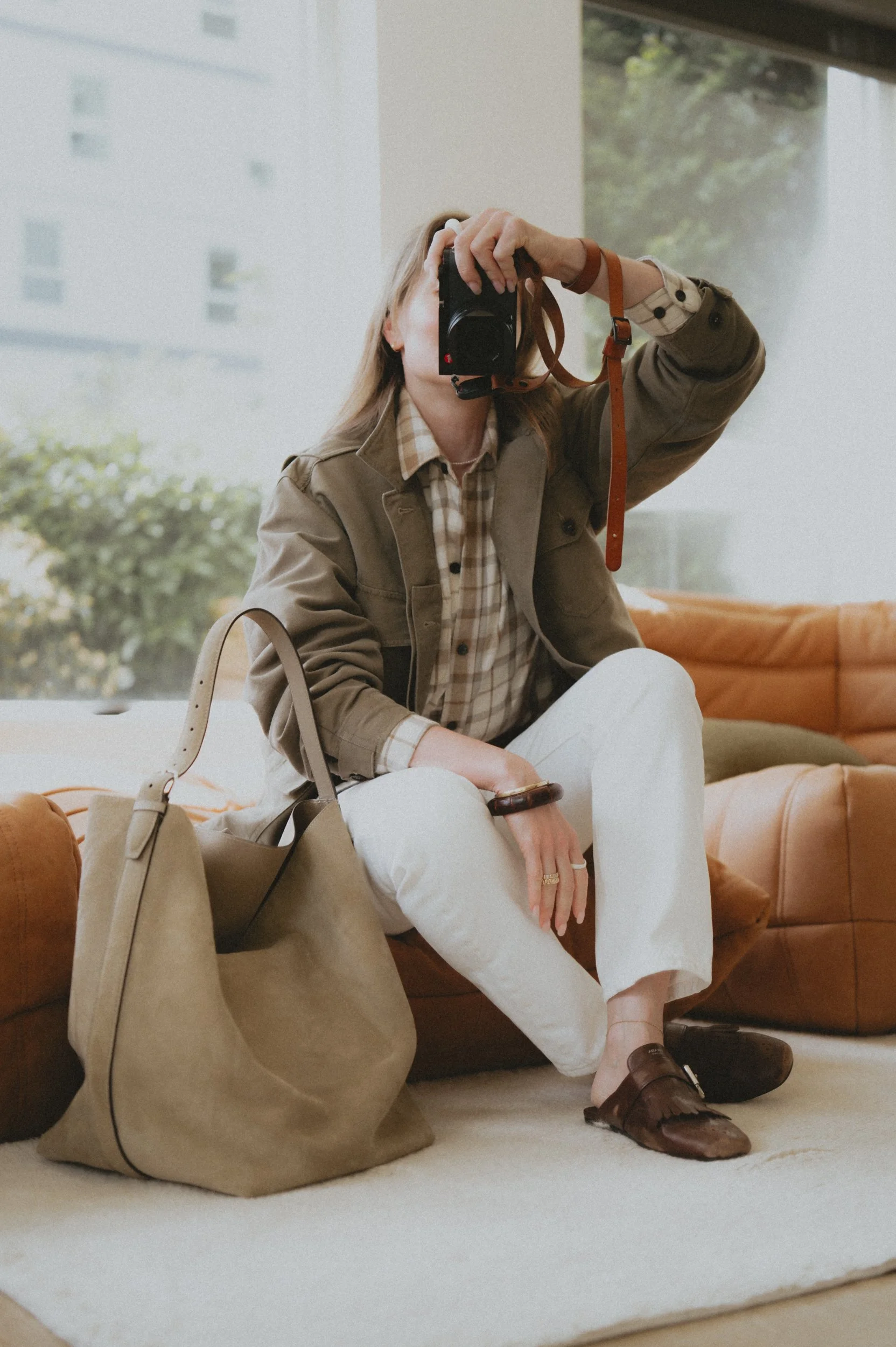Buck Mason soft olive all day field jacket LL Bean flannel shirt Levi's 501 white jeans prada shuffle mules Toteme belted tote in suede Bottega veneta statement bracelet in python