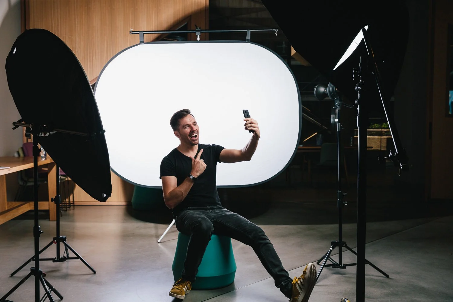 Photographer taking his own picture, being fun and silly