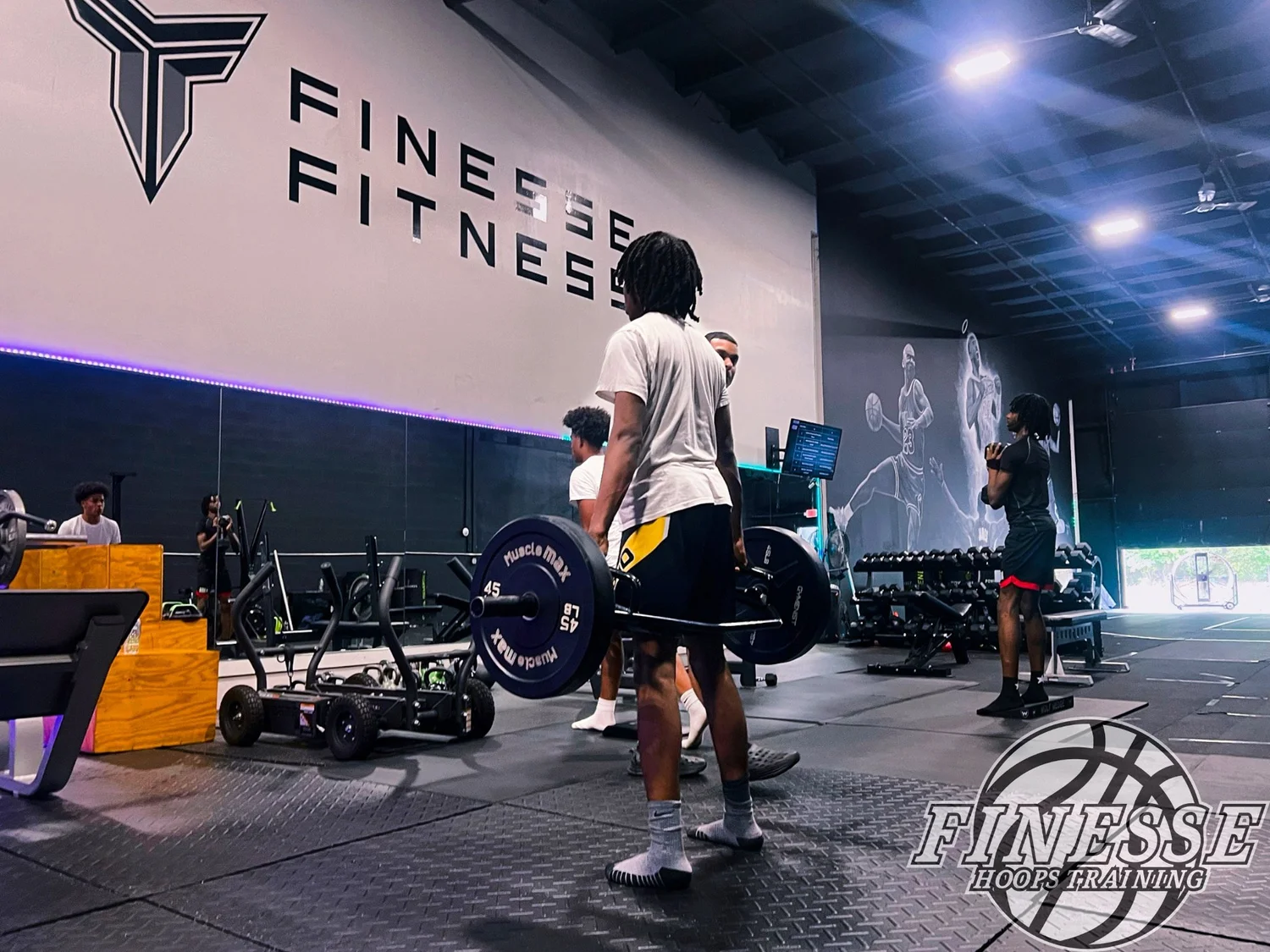 Athletes training in the Finesse Fitness weight room in Wallingford