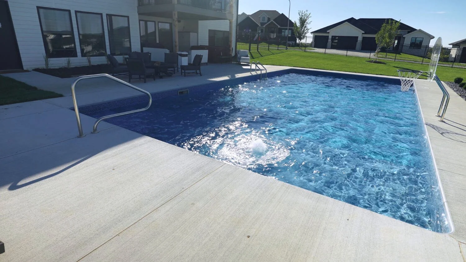 custom pool and patio Omaha, NE with shared design elements built for everyday outdoor enjoyment