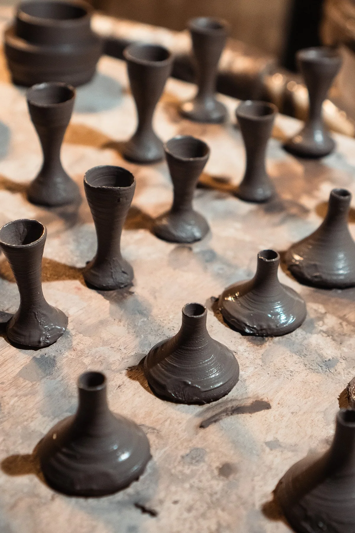 Handmaking ceramic kyusu teapots on the wheel as part of a slow pottery making process.