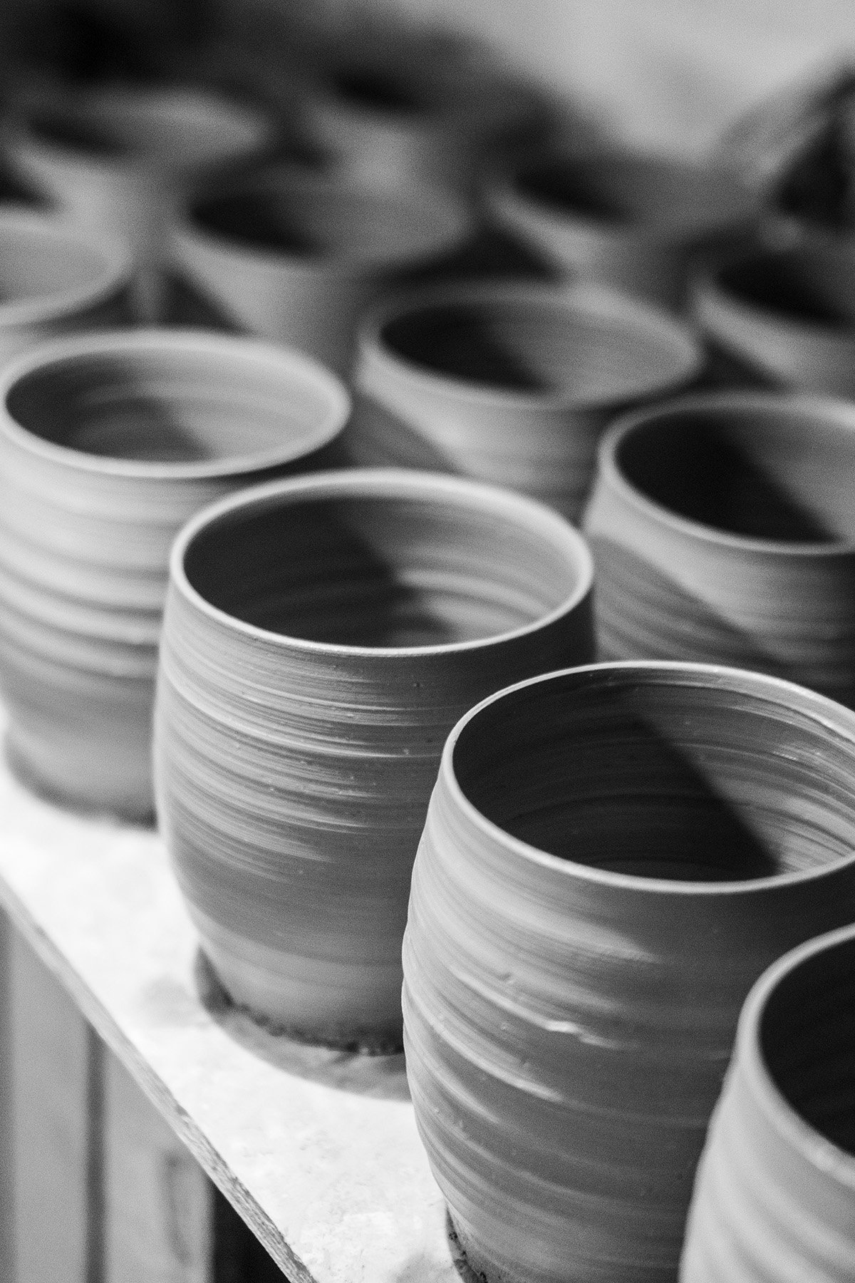 Quiet moments inside the pottery studio where handmade teaware and ceramic objects are created.