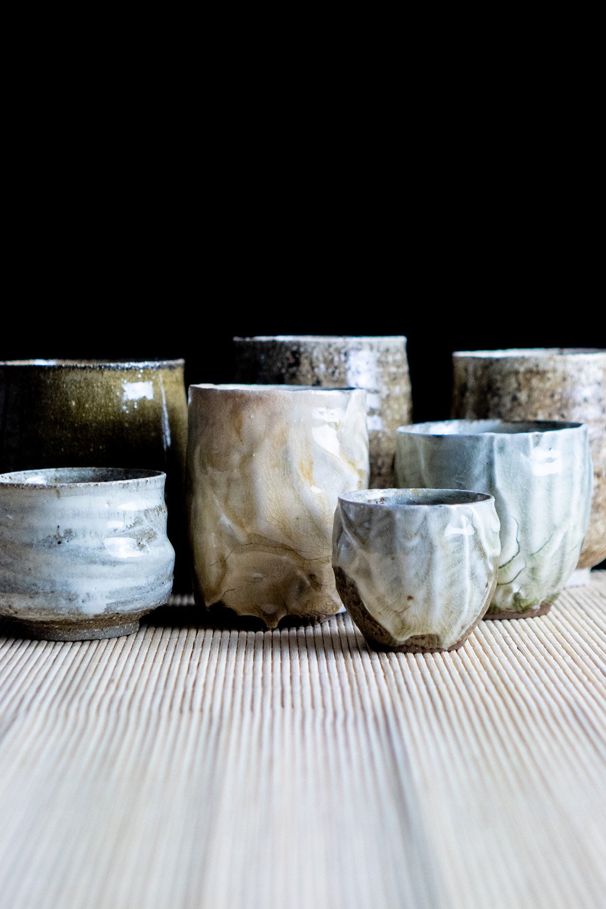 Ash glazed ceramic cups made for daily tea rituals, featuring soft textures and natural wood ash surfaces.