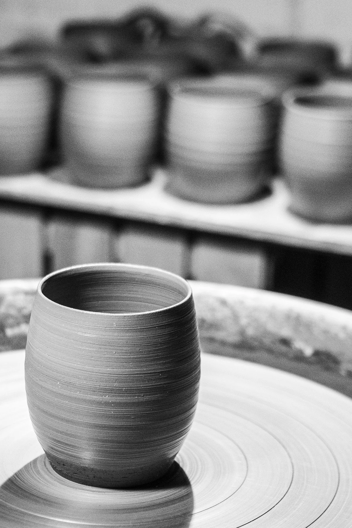 Quiet moments inside the pottery studio where handmade teaware and ceramic objects are created.