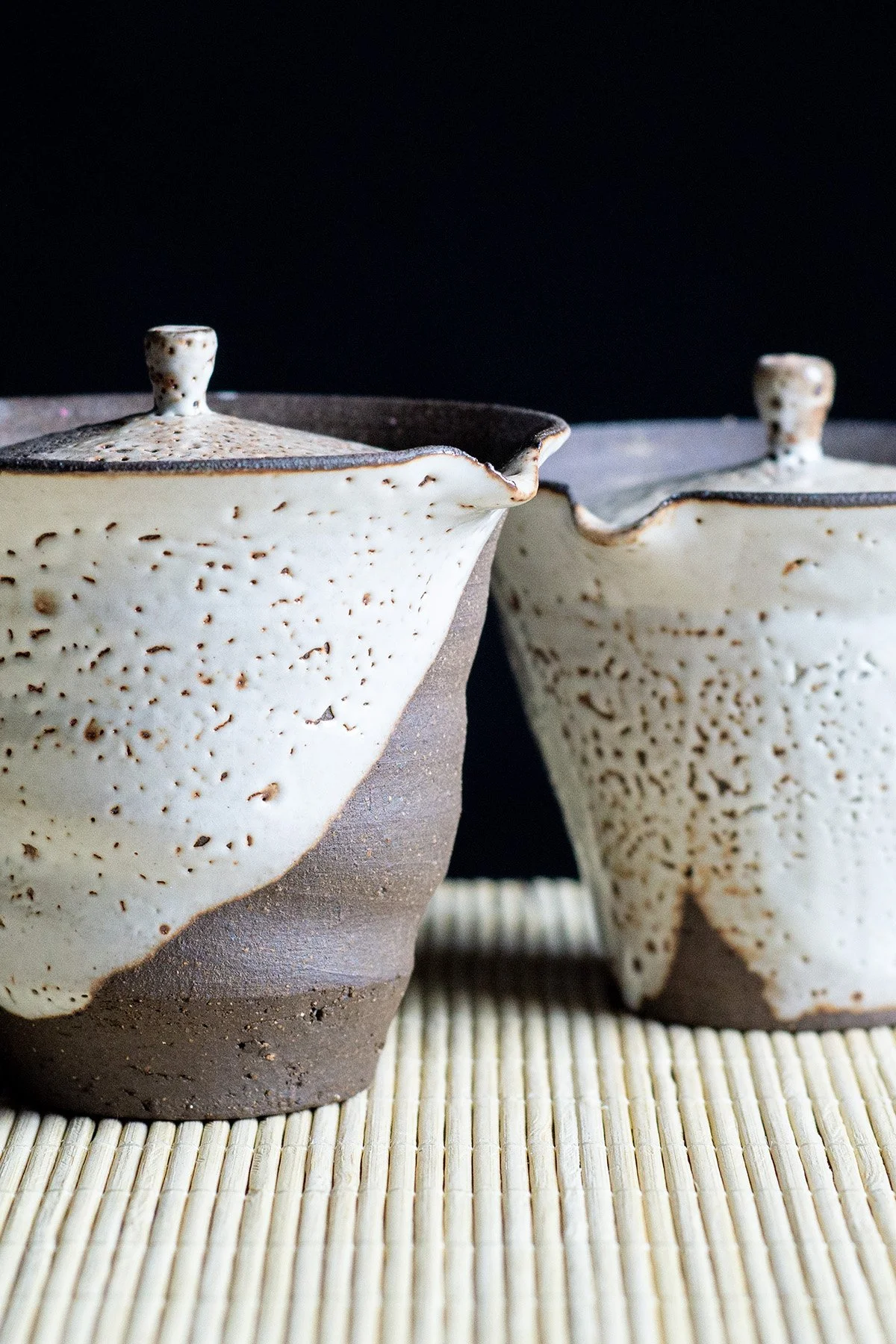 Minimal shiboridashi teapot used for slow tea rituals and delicate loose leaf tea brewing.