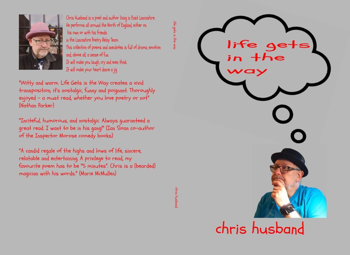 Book cover for "Life Gets in the Way" by Chris Husband, featuring a photo of the author in a pink hat and glasses, with a palette of red and black text on a grey background. The cover includes a speech bubble with the book title, author's name in red at the bottom, and quotes from reviews.