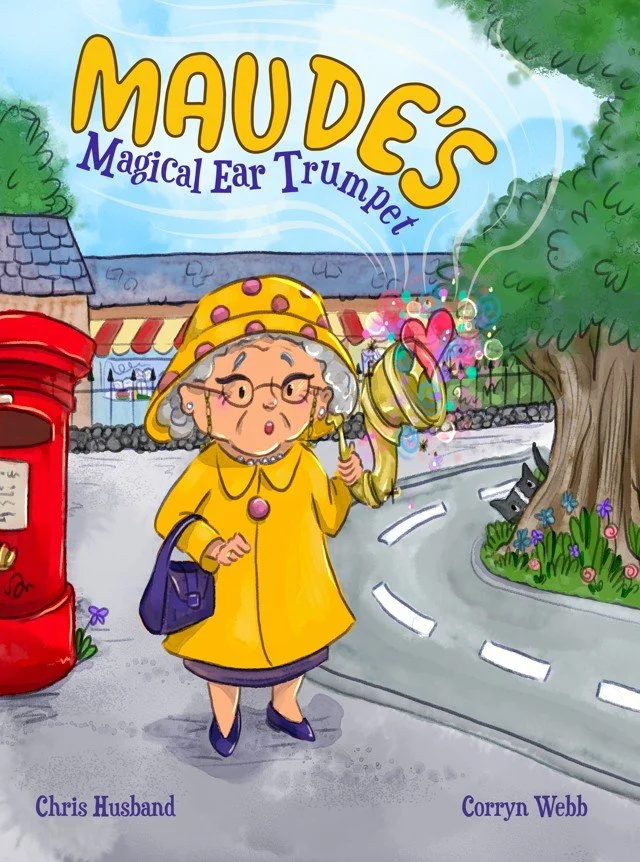 Book cover titled "Maude's Magical Ear Trumpet" featuring an elderly woman in a yellow coat and matching hat, holding a golden ear trumpet with colorful sparkles, standing near a red mailbox and a tree with flowers.