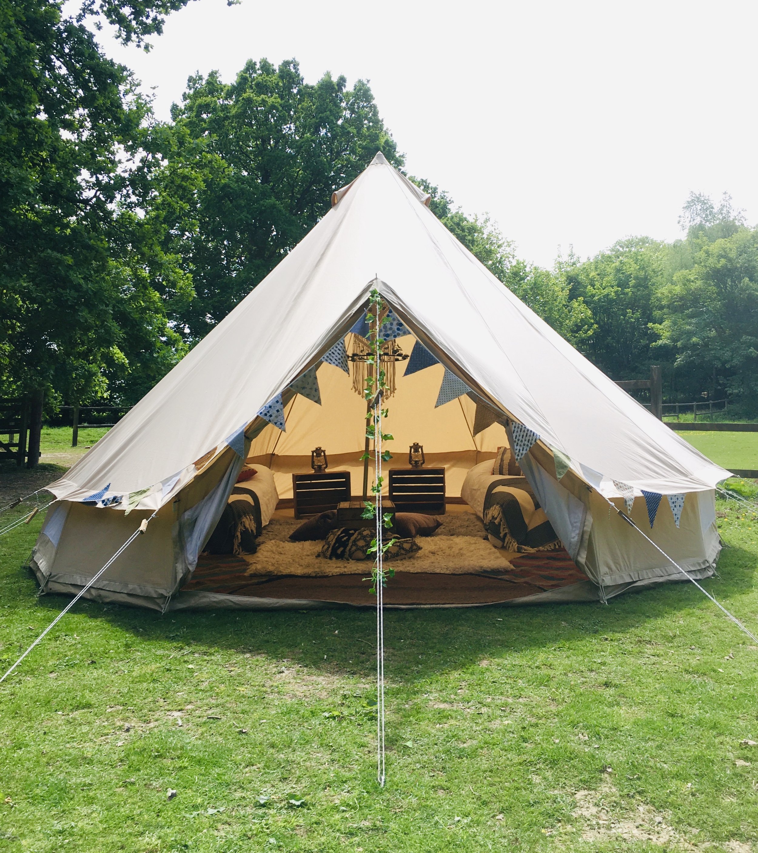 Glamping pitch at Evergreen Farm Woodland campsite, East Grinstead