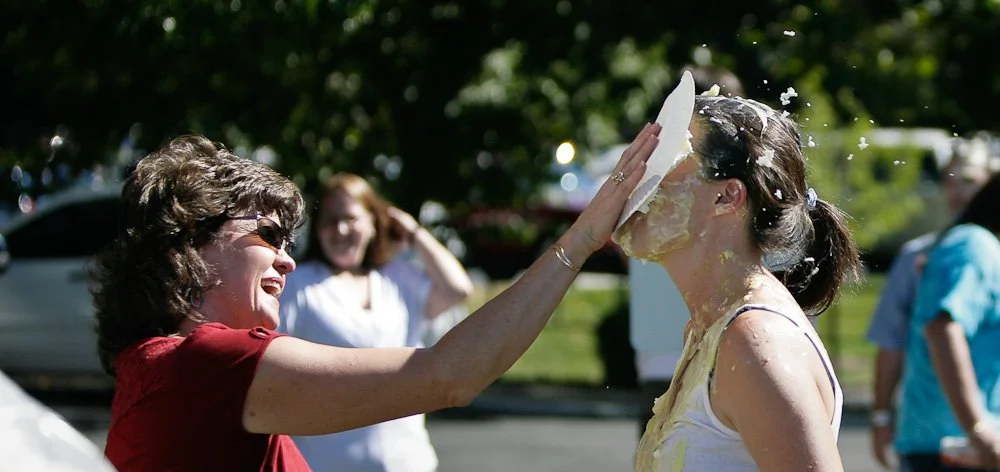 09-September_qwest_pie_throwing_0111_(3957684658).jpg