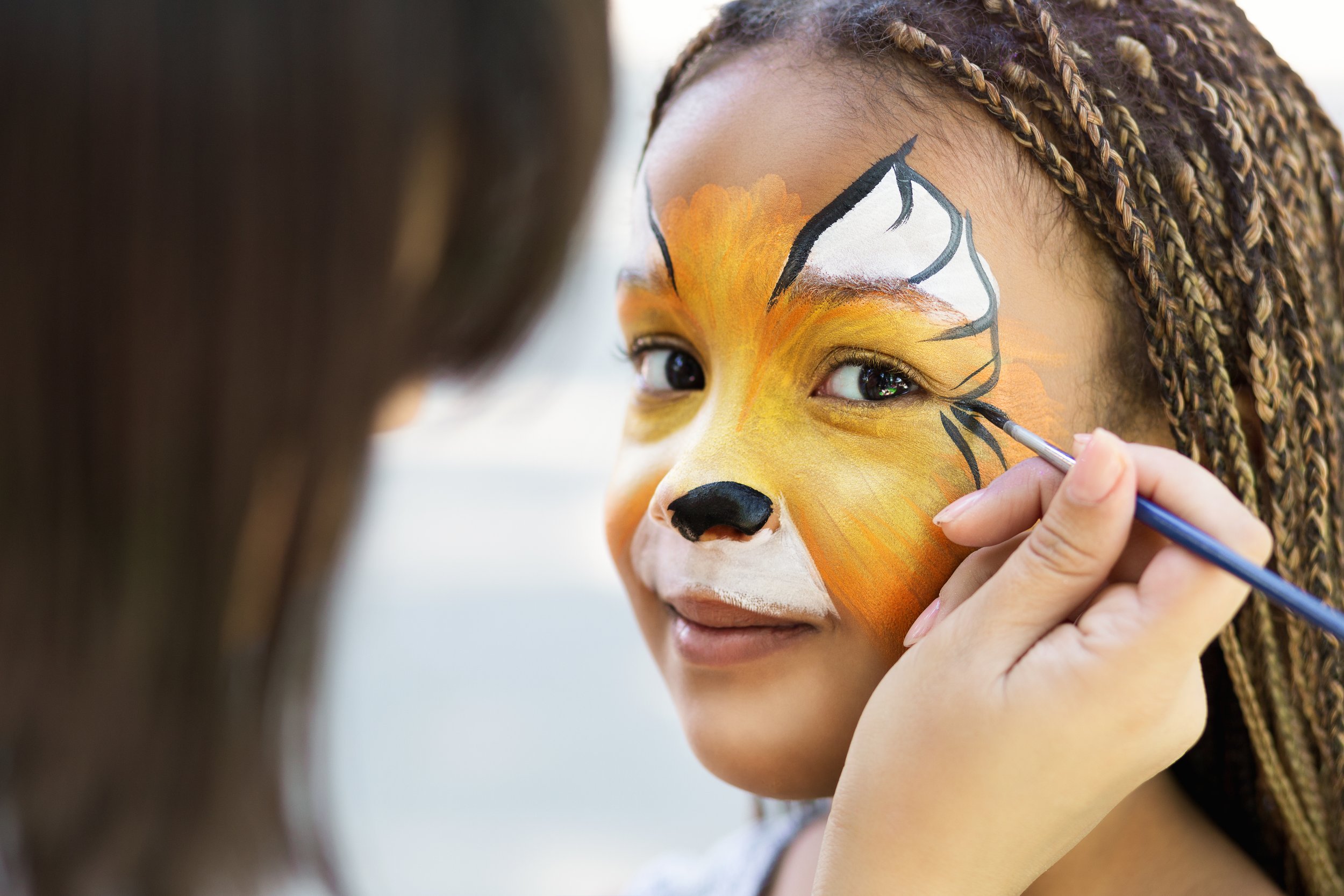 little-girl-getting-her-face-painted-by-face-paint-2022-10-07-02-19-11-utc.jpg