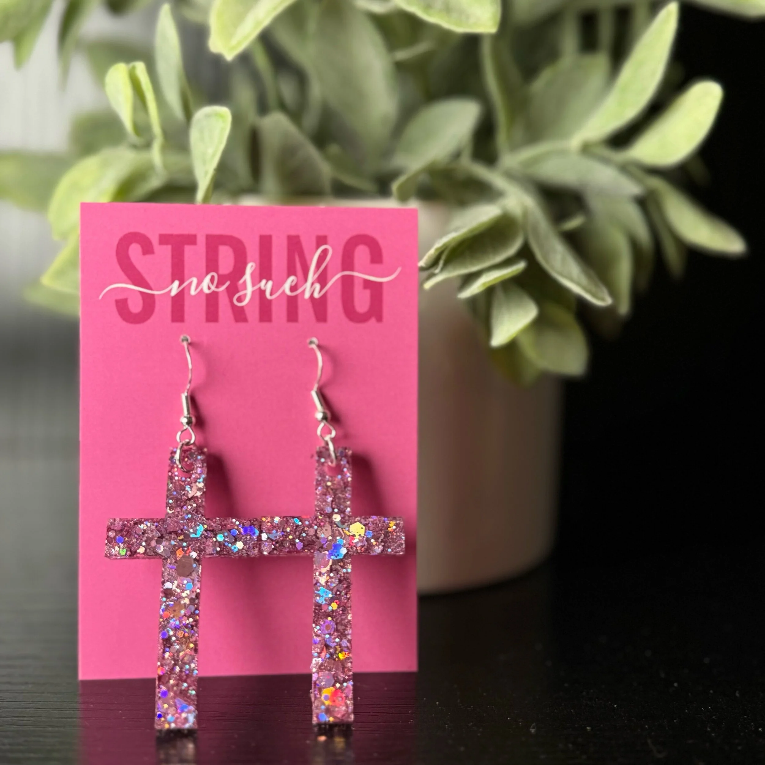 Pink upside down cross earrings deals