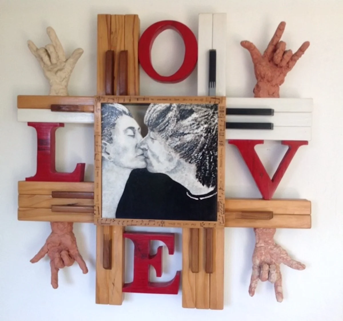 Sam Fleeger  All You Need is
Love, 2005, mixed media 32" x 32" x 3.75"