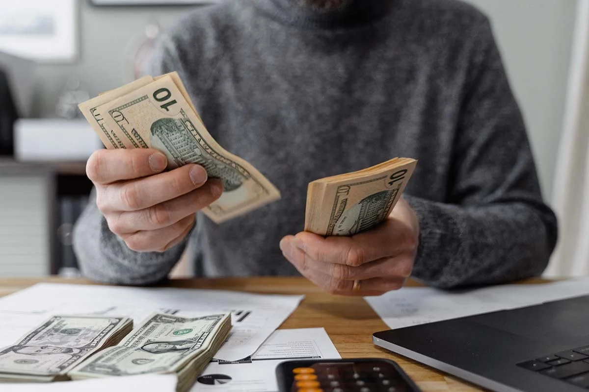 California investor counting money for costly 1031 Exchange mistake