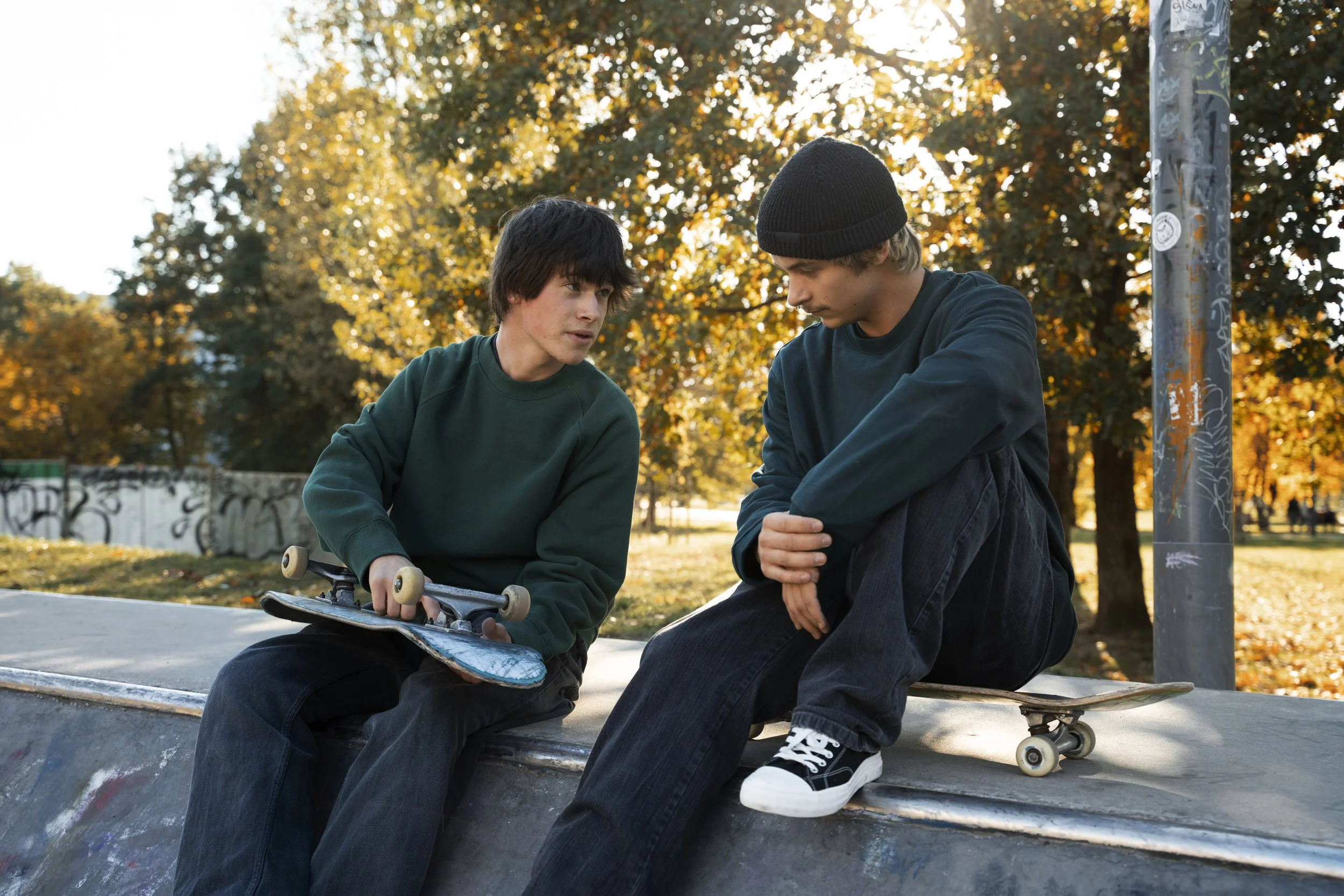 teen boys playing basketball at the boy center