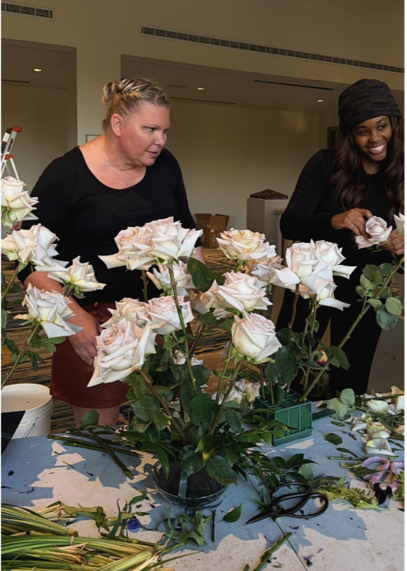 Two ladies working with roses
